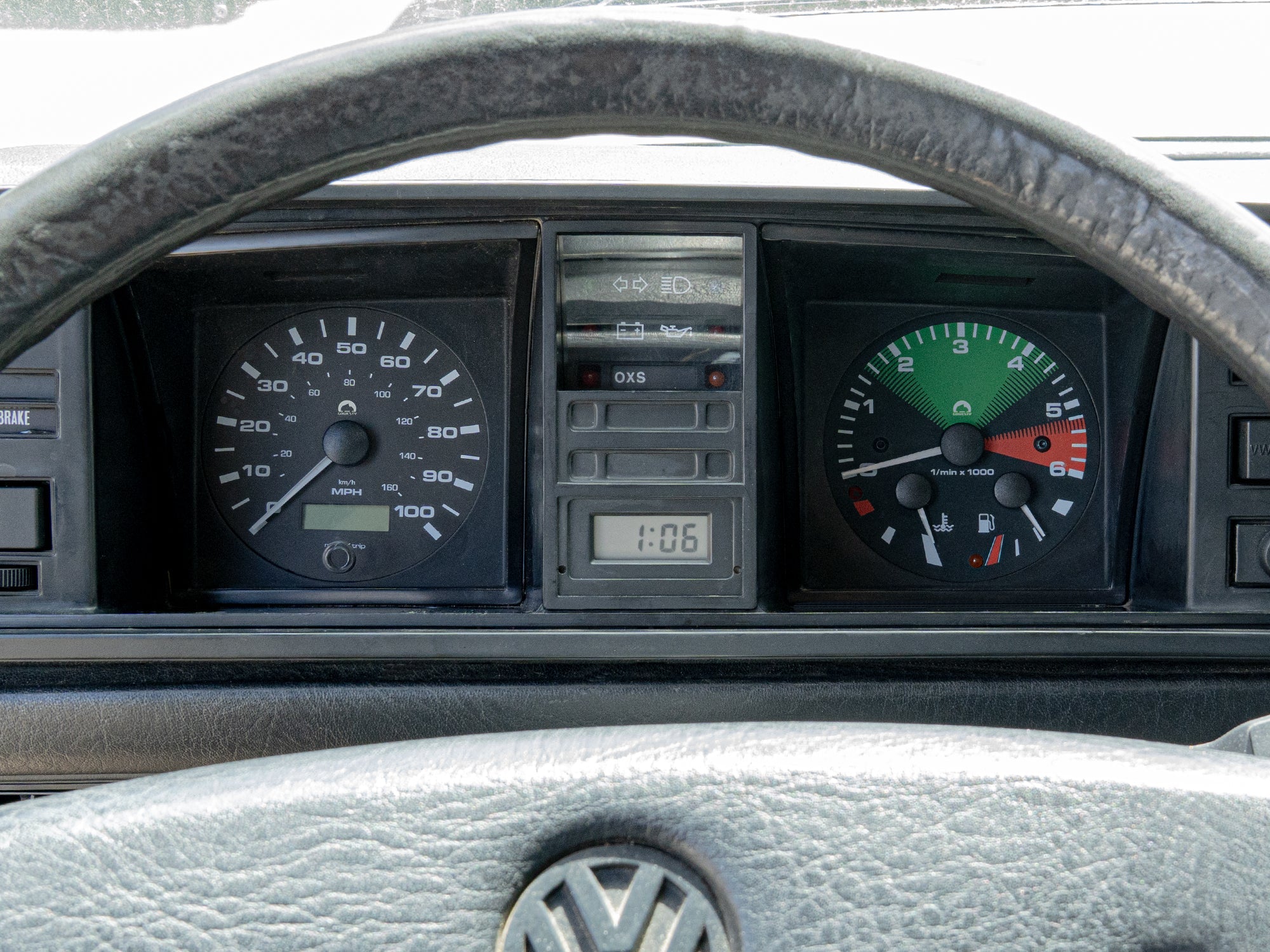 GoWesty electronic speedometer kit installed in a Vanagon, showing the MPH display and vehicle dashboard with branding logo.