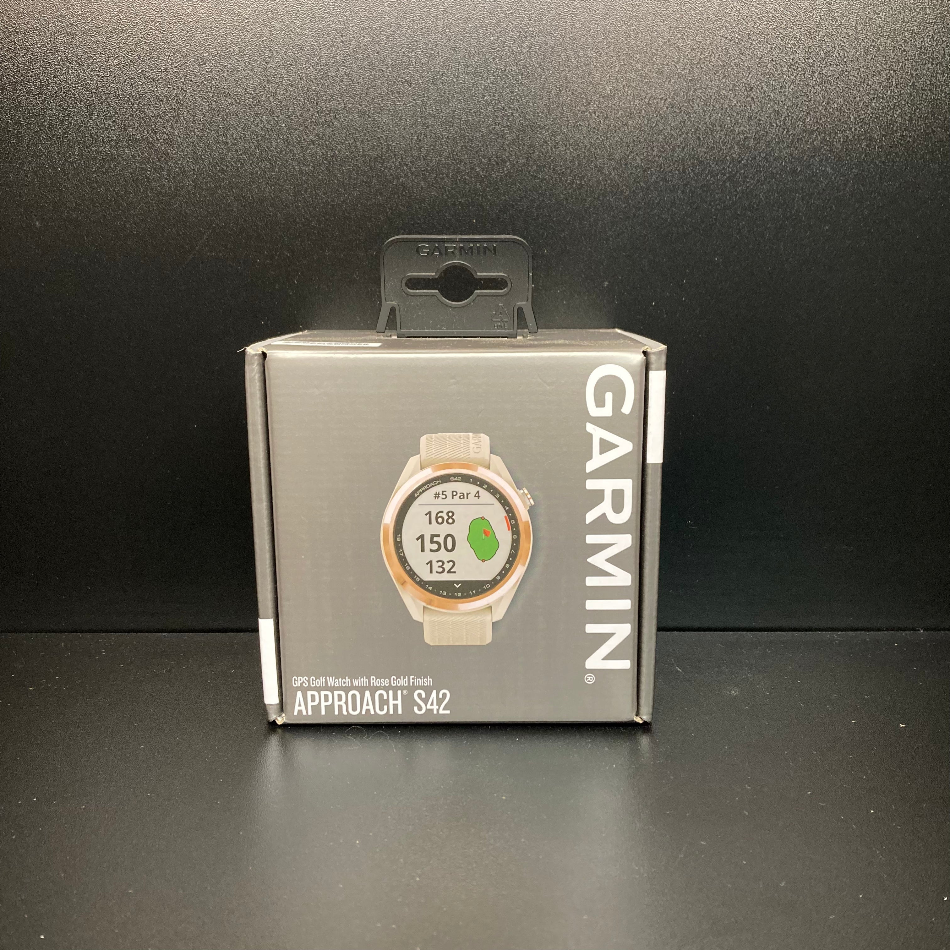 Garmin S42 watch, a sleek electronics device with a round display and sporty design, suitable for golf and fitness activities.