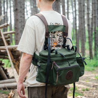 Backcountry Sportsman All Day Lumbar Pack with multiple compartments, shown in outdoor setting with Gavin Weiers.