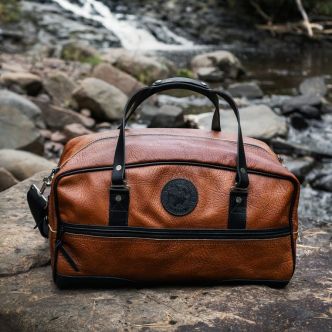 Backcountry Sportsman Bison Leather Weekender Duffel bag with sturdy leather construction and spacious design for travel.