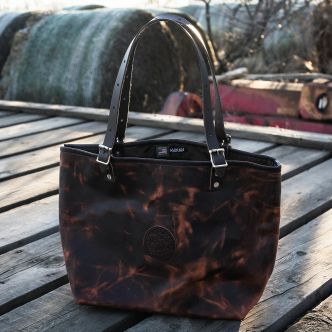 Backcountry Sportsman Heritage Leather Market Tote made of waxed bison leather, showing the spacious interior and sturdy handles.