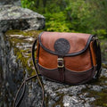 Backcountry Sportsman Bison Leather Medium Shell Purse with a structured design and smooth leather finish.