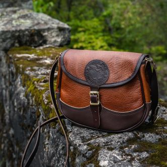 Backcountry Sportsman Bison Leather Medium Shell Purse with a structured design and smooth leather finish.