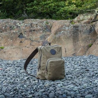 Large standard backpack by Backcountry Sportsman with multiple compartments and padded straps, suitable for outdoor adventures.