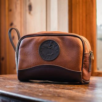 Backcountry Sportsman Bison Leather Sportsman's Kit Bag with sturdy handles and detailed leather craftsmanship.