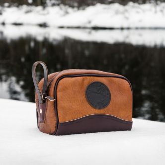 Backcountry Sportsman Bison leather sportsman's kit bag with sturdy handles and spacious compartments, ideal for outdoor gear storage.