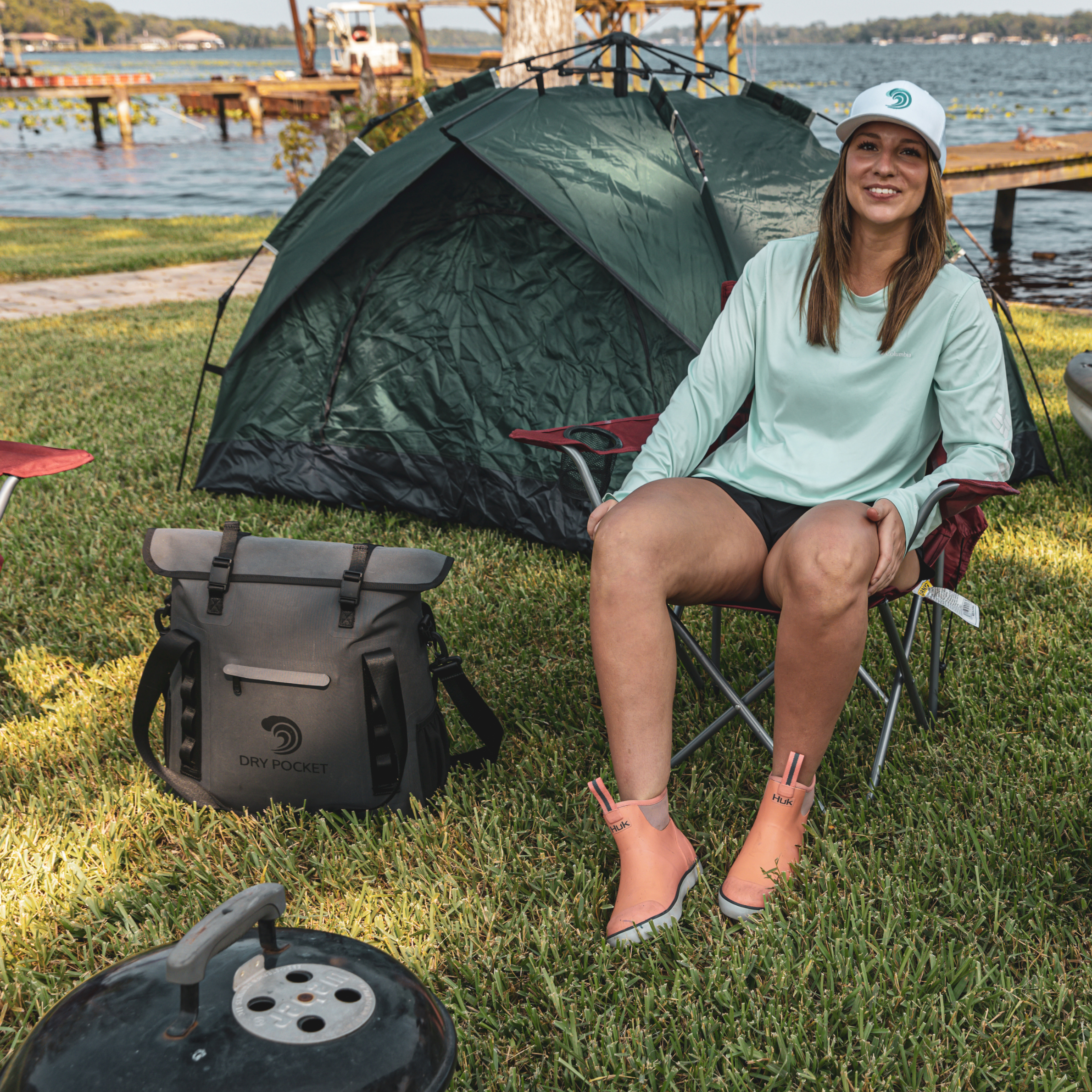 Grey Dry Pocket waterproof floating tote cooler with auto sealing design, ideal for keeping beverages and food dry on water.