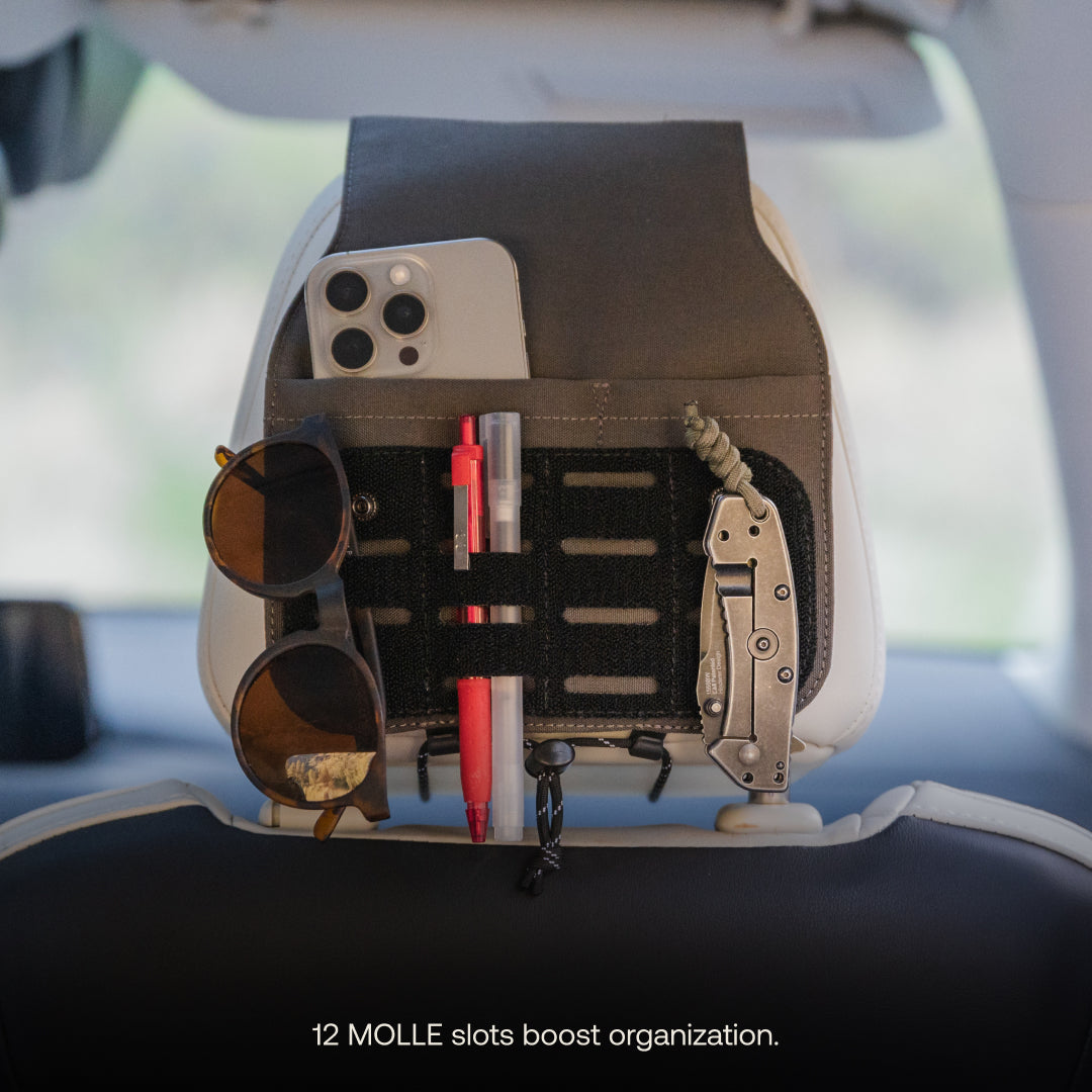 Luno® headrest organizer with multiple pockets for car essentials, featuring a sleek design and durable fabric.