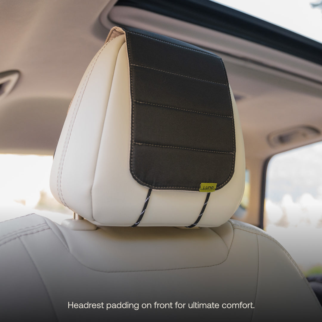 Luno® headrest organizer featuring multiple pockets for storage in a car interior setting.