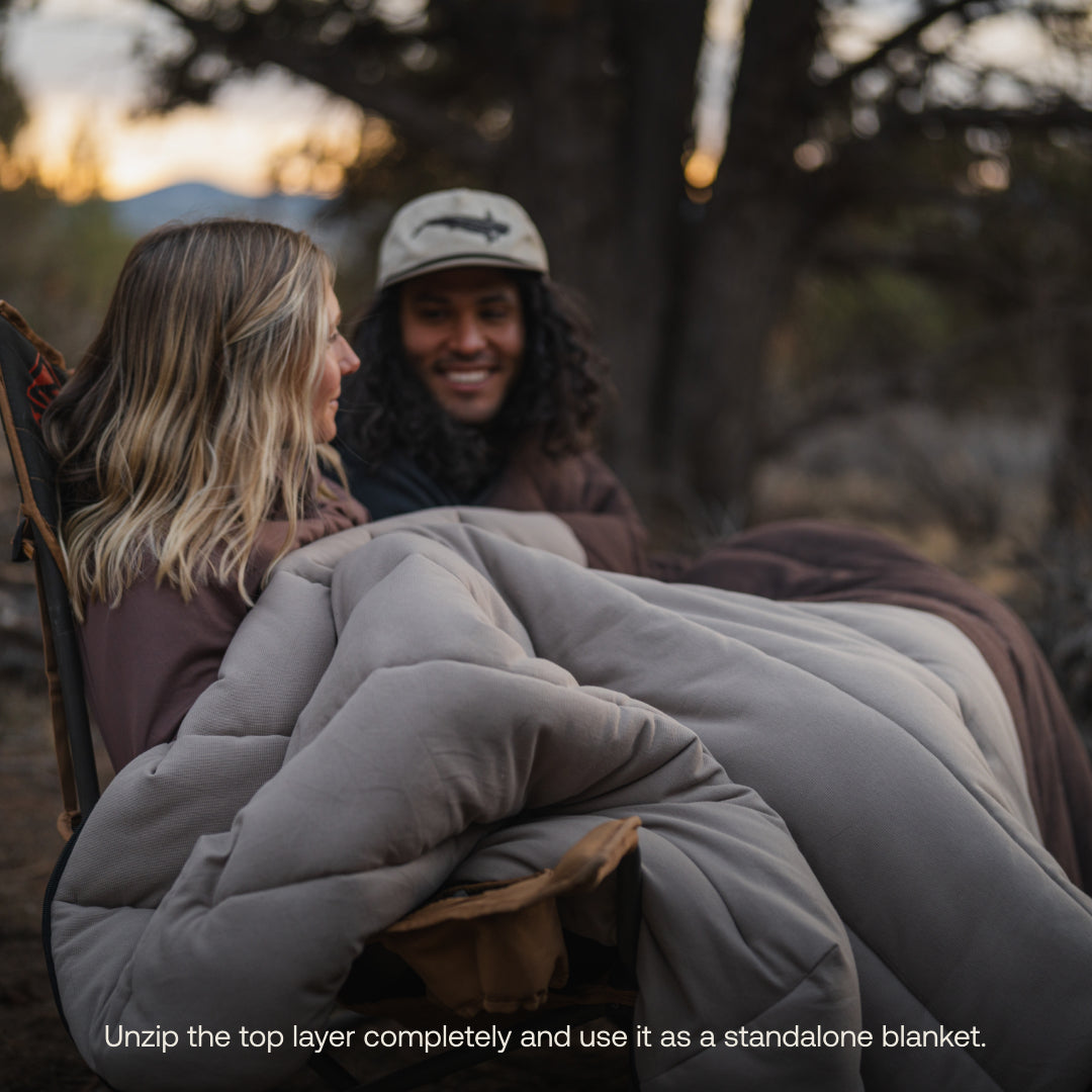 Luno® fitted sleeping bag comforter in a cozy, open position showcasing soft fabric and insulated design.