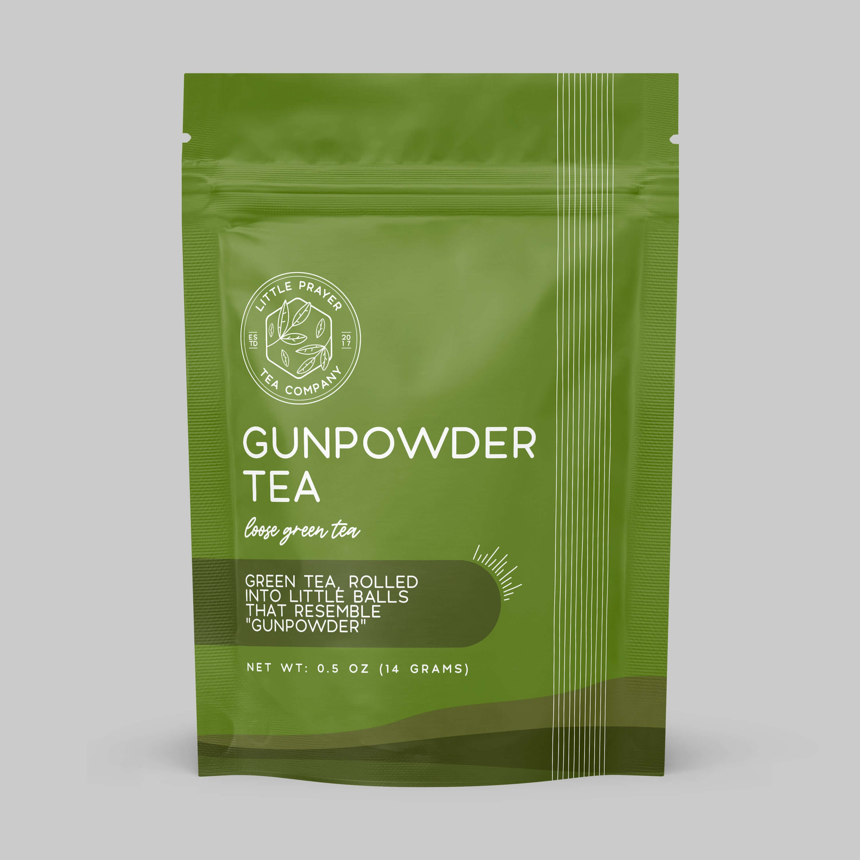 Small sample of Little Prayer Tea Company's Gunpowder Green Tea, featuring tightly rolled green tea leaves.