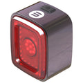 ZEITBIKE Vision Pro bicycle tail light mounted on a bike, showing bright red LED illumination for visibility and safety.