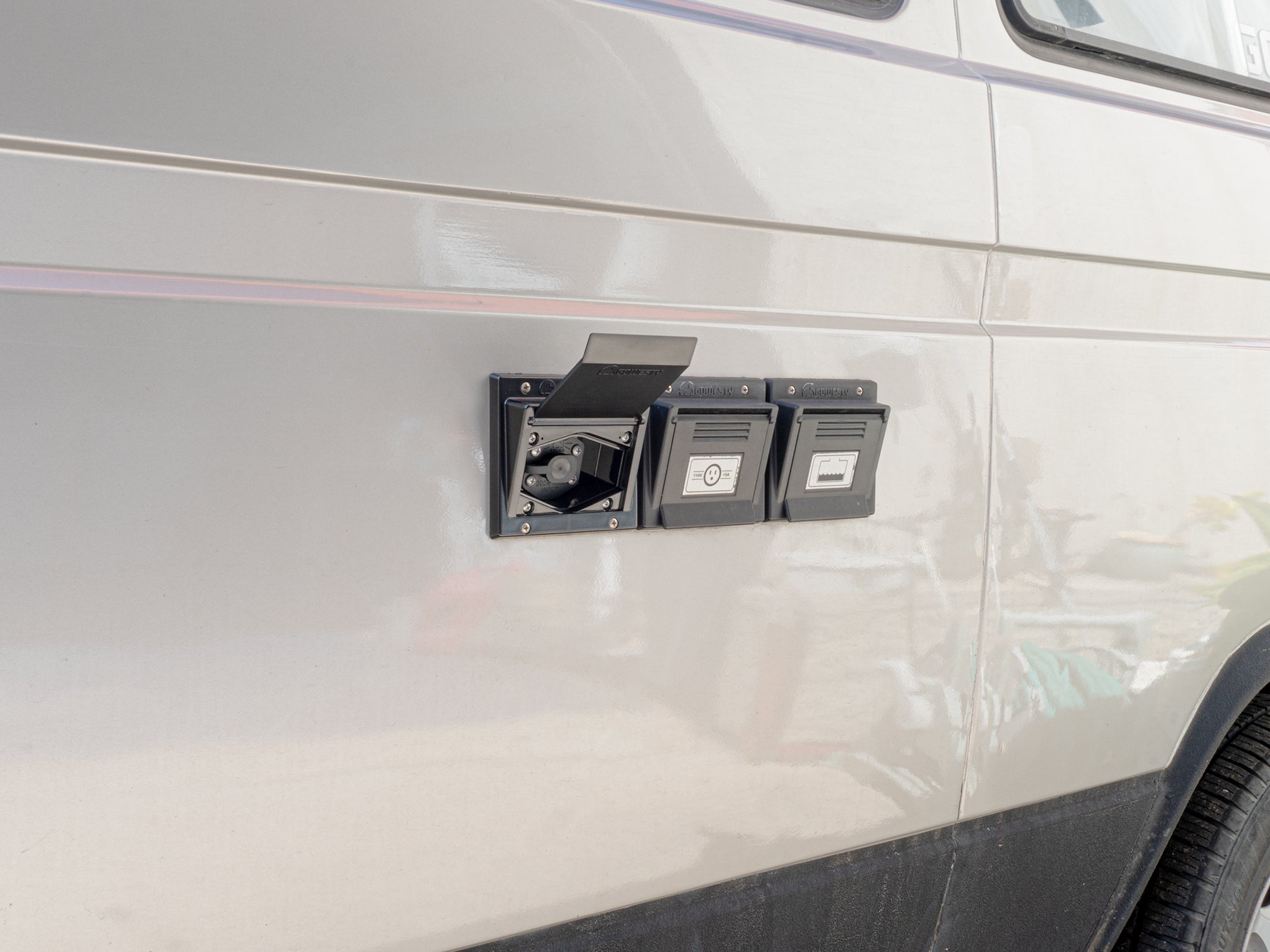GoWesty Solar Hook-Up Box for RVs, featuring ports and connections for solar power installation on a camper or RV.
