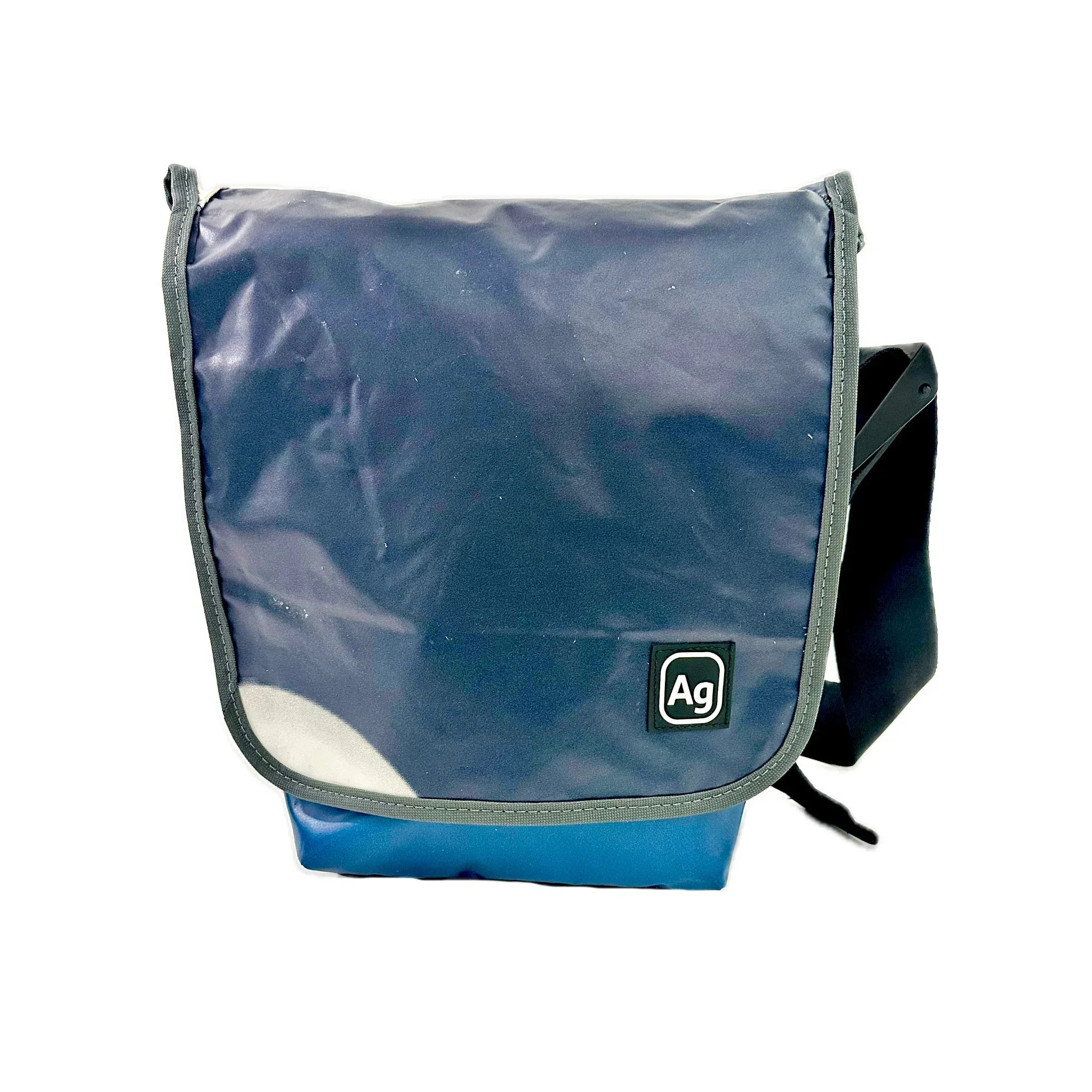 Blue Alchemy Goods Haversack Satchel by ZEITBIKE, recycled billboard shoulder bag made in the USA, featuring durable eco-friendly design.