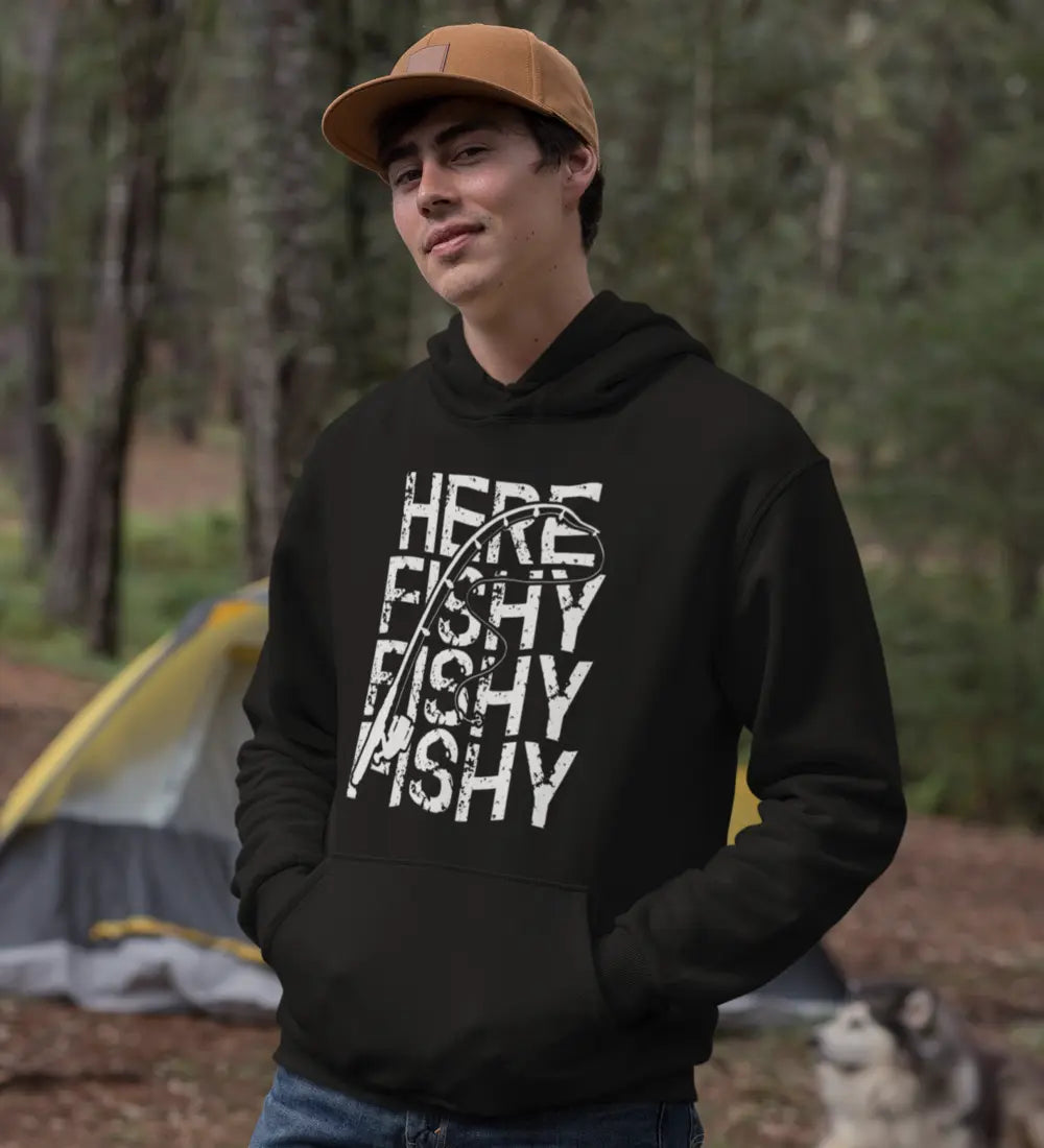 Black Here Fishy Fishy unisex hoodie by Outdoorzees, featuring a fish-themed graphic on the front, worn by a model.