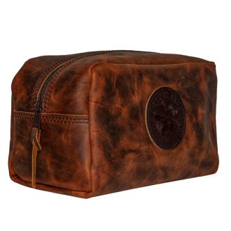 Backcountry Sportsman Heritage Leather Kit Bag shown from side angle with leather strap and vintage design.
