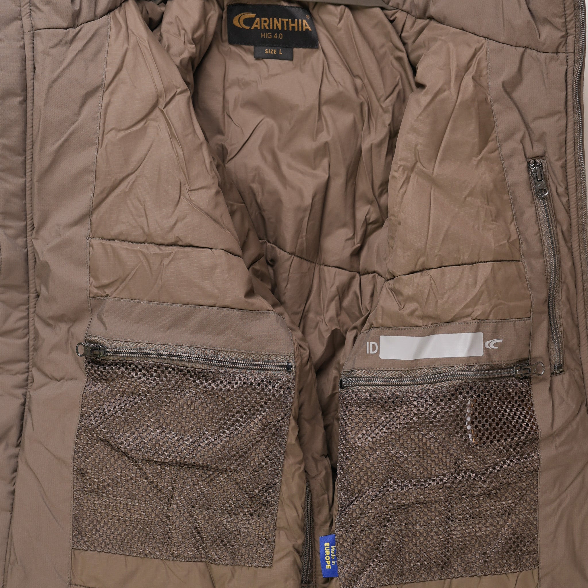 Carinthia HIG 4.0 jacket by Americana Pipedream Apparel featuring multiple front pockets and durable outdoor fabric.