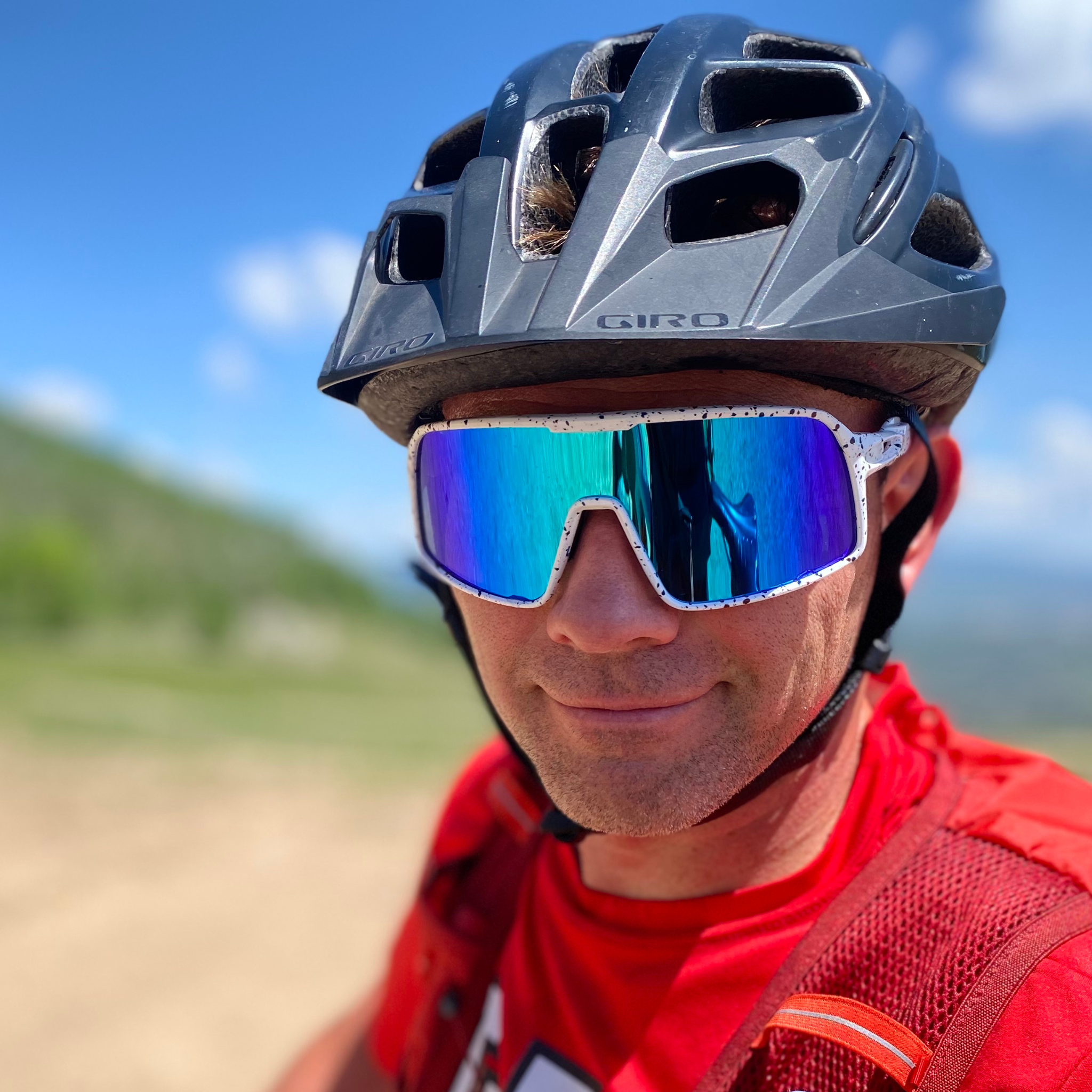 Eastern Outer Flying Dog Snowstorm sunglasses with blue-mirror Revo lenses, showcasing a sleek matte finish and modern design.
