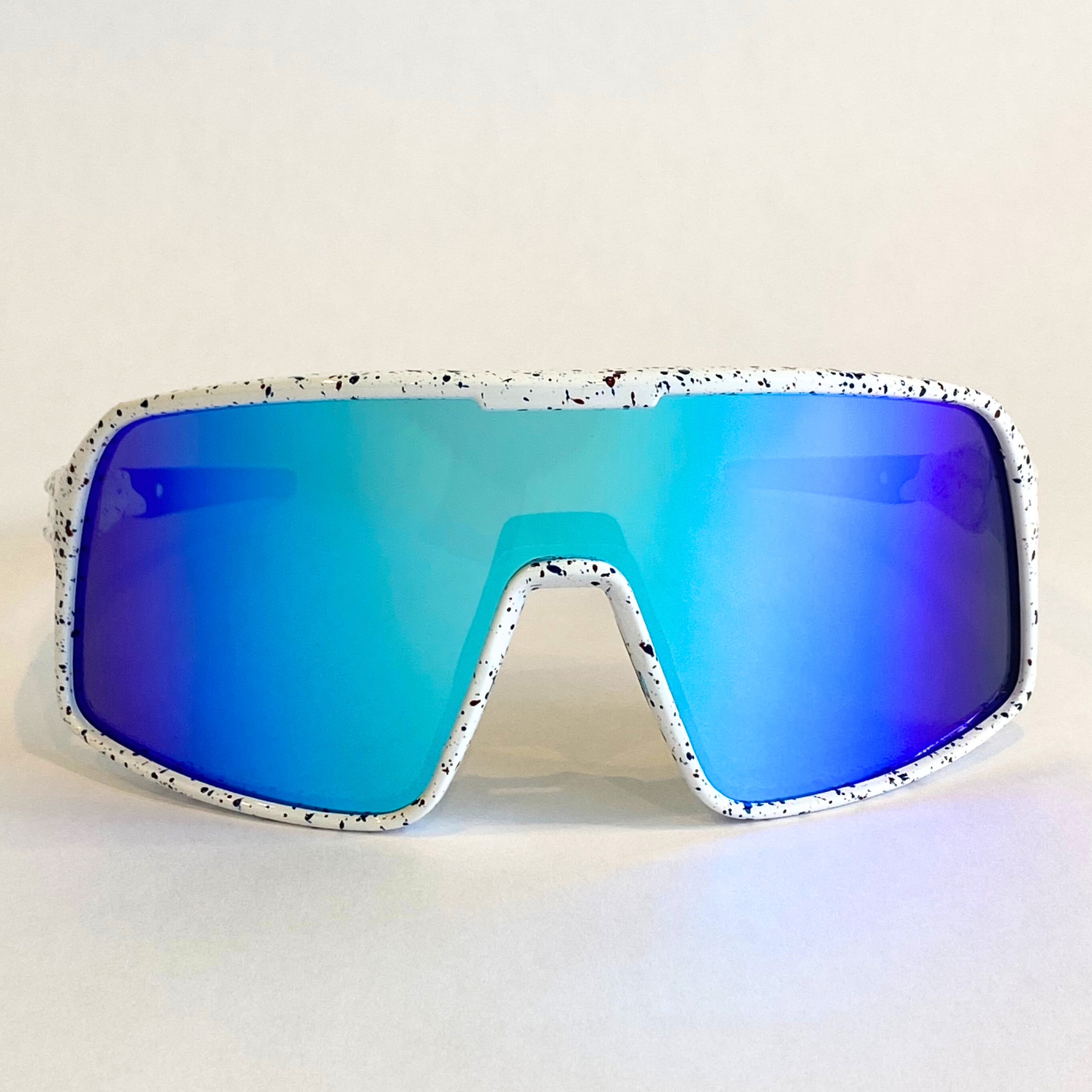 Flying Dog Snowstorm sunglasses with blue-mirror Revo lenses by Eastern Outer, shown from a straight-on angle.