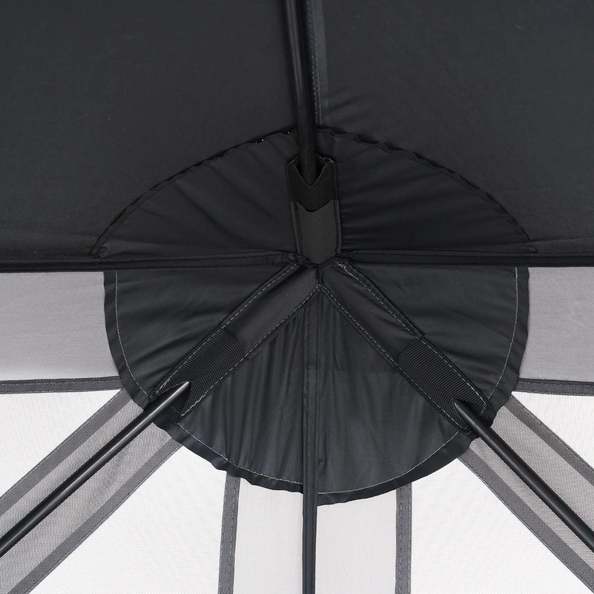 Wild Land Hub Screen House 600 featuring spacious mesh walls and a sturdy frame in a natural outdoor setting.