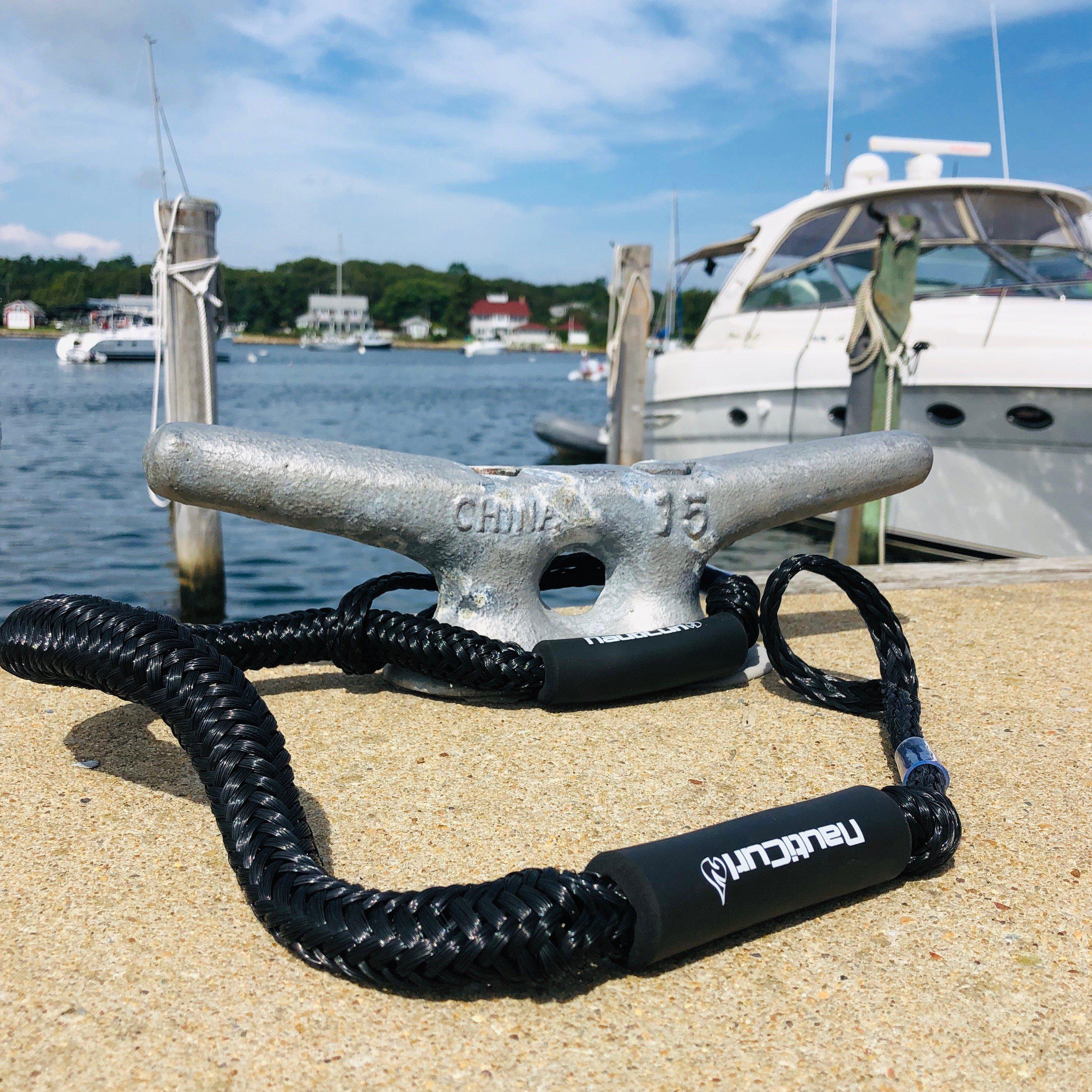 Two NautiCurl LLC shock-absorbing bungee boat ropes with secure hooks, designed for safe and flexible boat towing and docking.