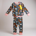 Navy wildflower bamboo pajama set for kids with long sleeves and pants, featuring a floral pattern and comfortable fabric.