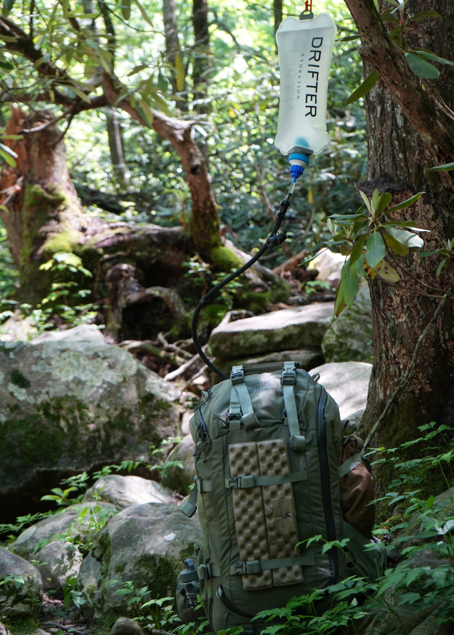 Drifter Hydration System bundle featuring water reservoir, tubing, and accessories for outdoor hydration needs.