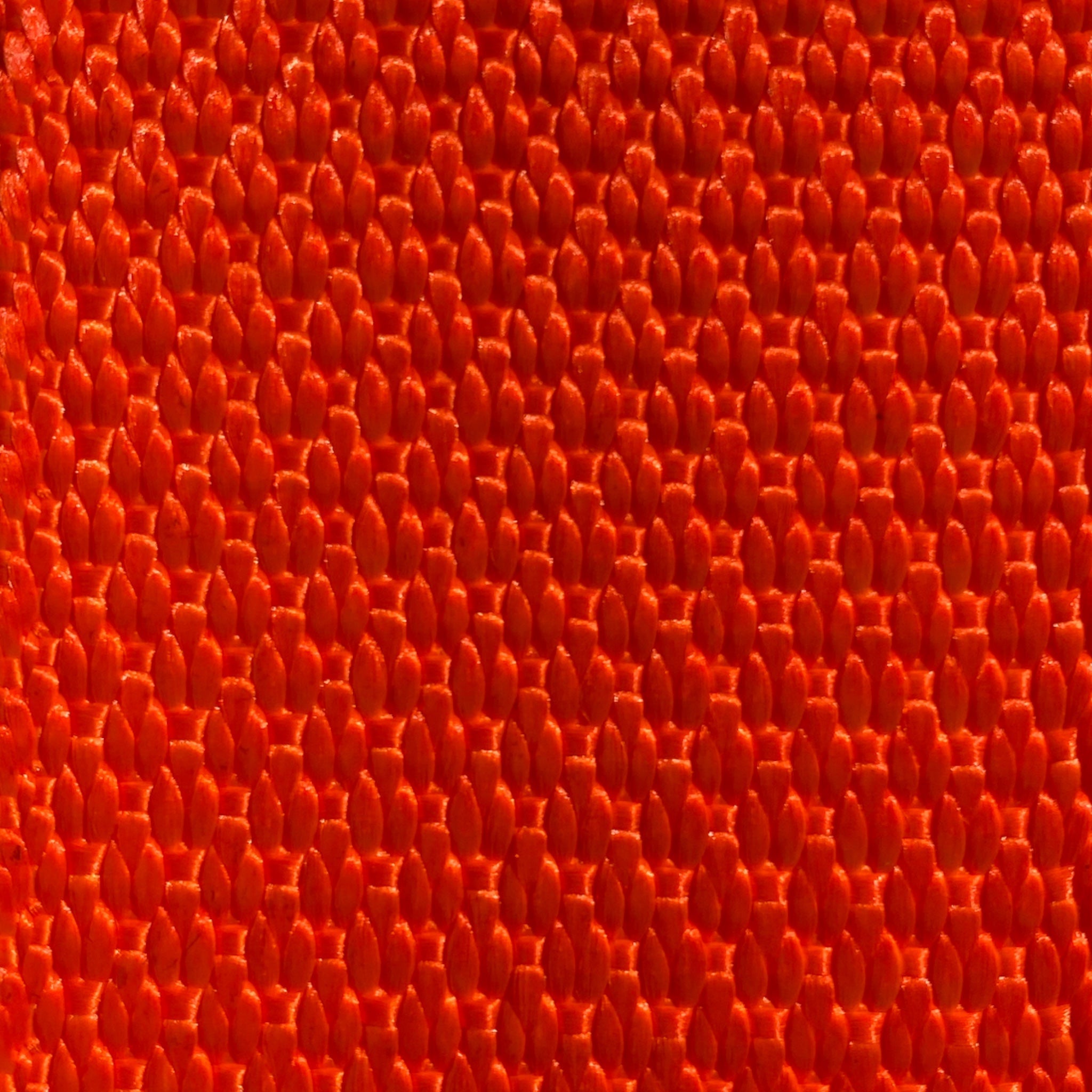 Four 24-inch RatchetStrap.Com axle straps with DiamondWeave™ fabric in various color options, designed for securing loads.