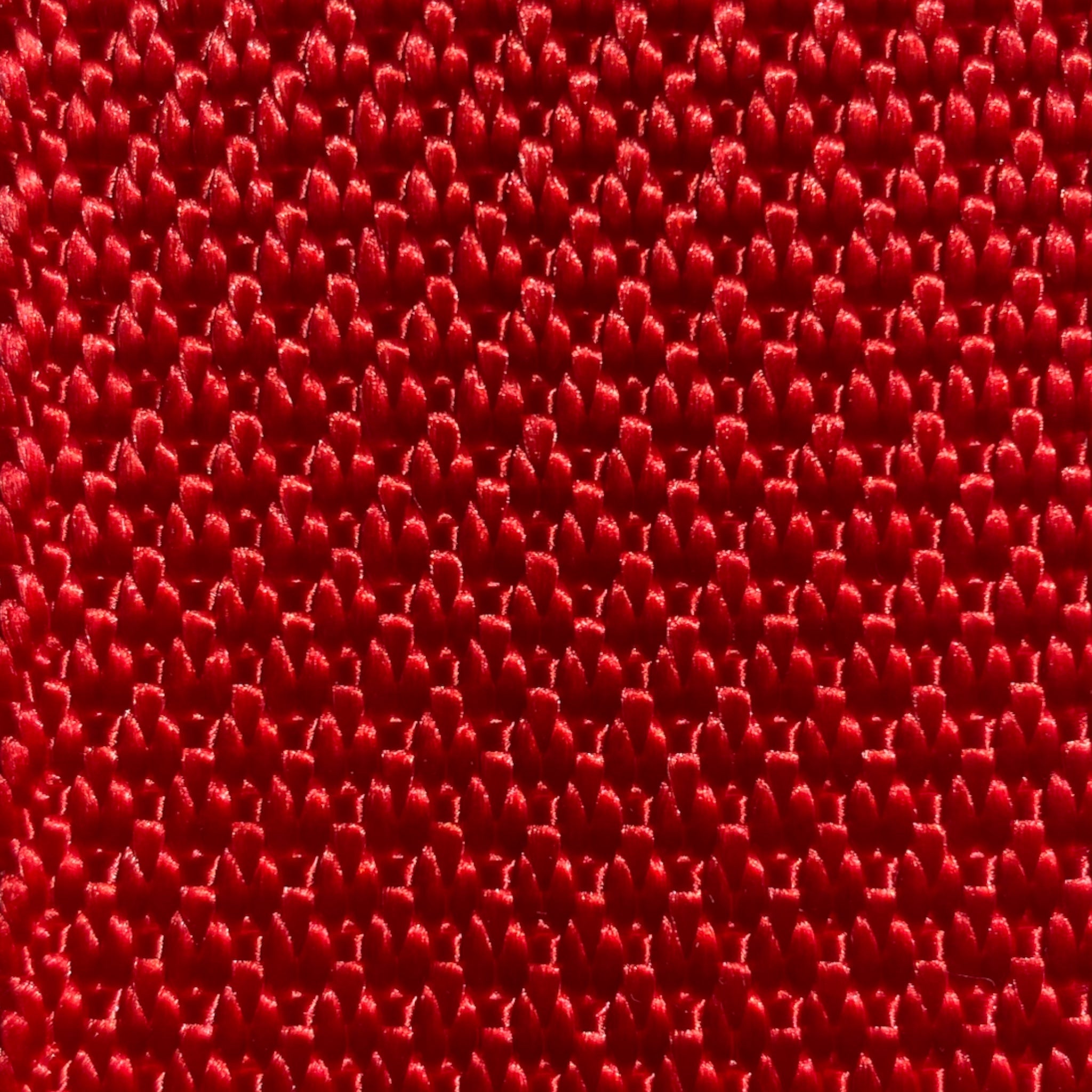 Set of four 24-inch RatchetStrap.Com Axle Straps with DiamondWeave™ material in various color options, designed for secure vehicle tie-downs.