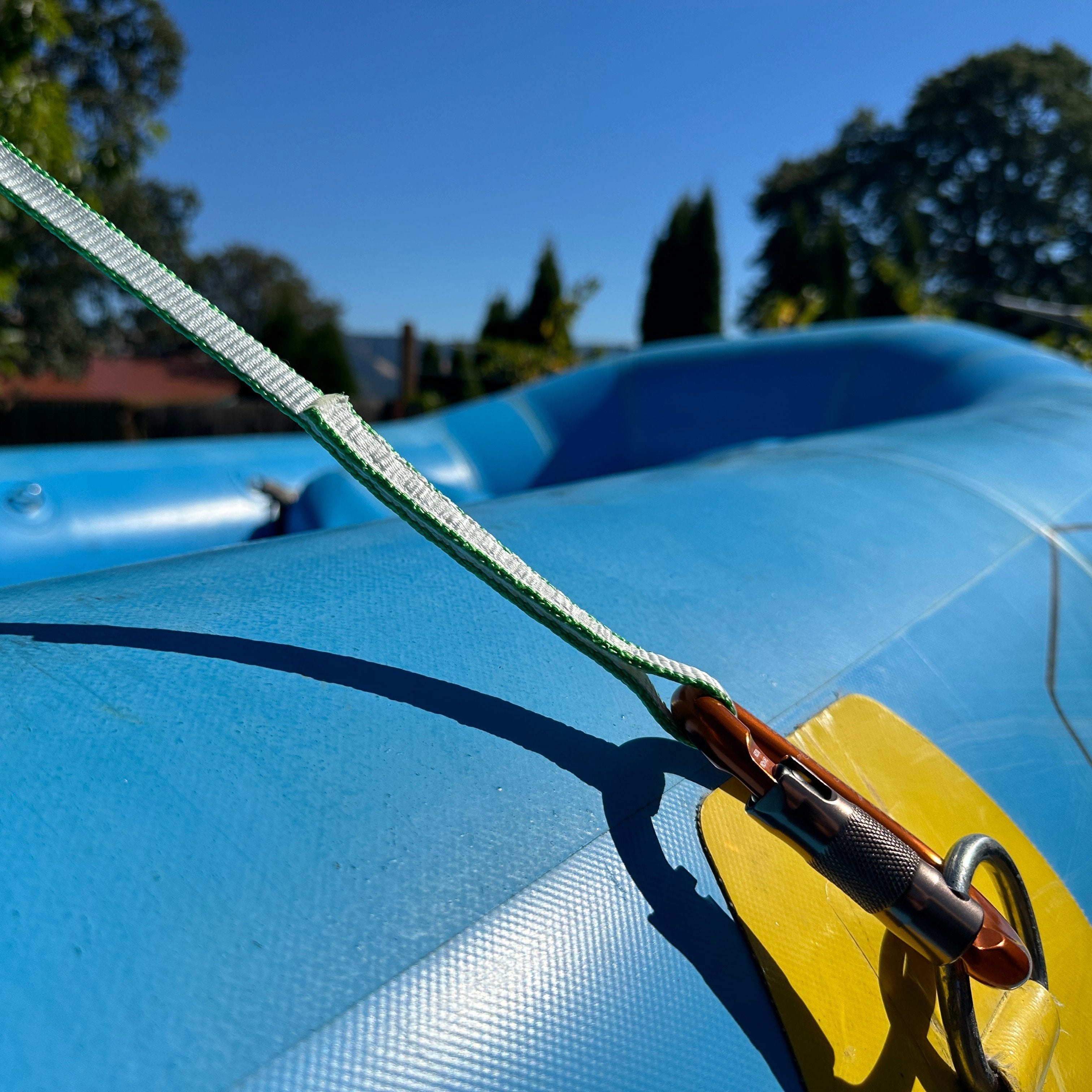 River Hardware rafting flip line with durable rope and handle for safety during whitewater rafting adventures.