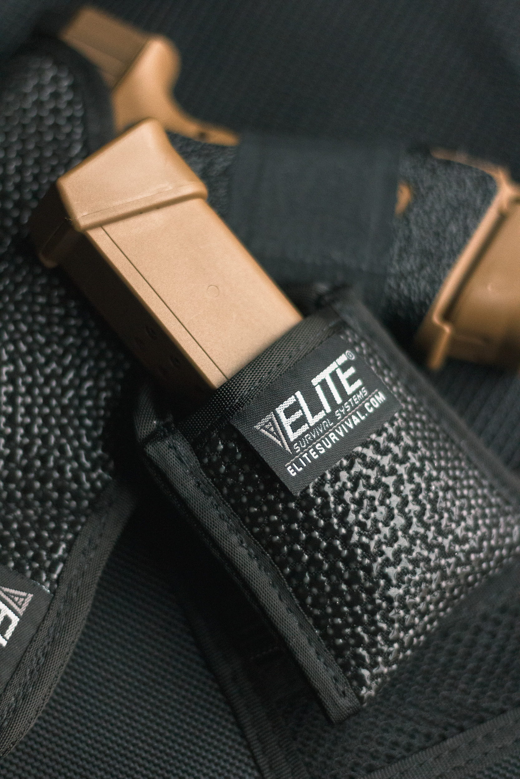 Elite Survival Systems Clipless Mag Pouch in black with a sleek design for concealed carry of magazines.