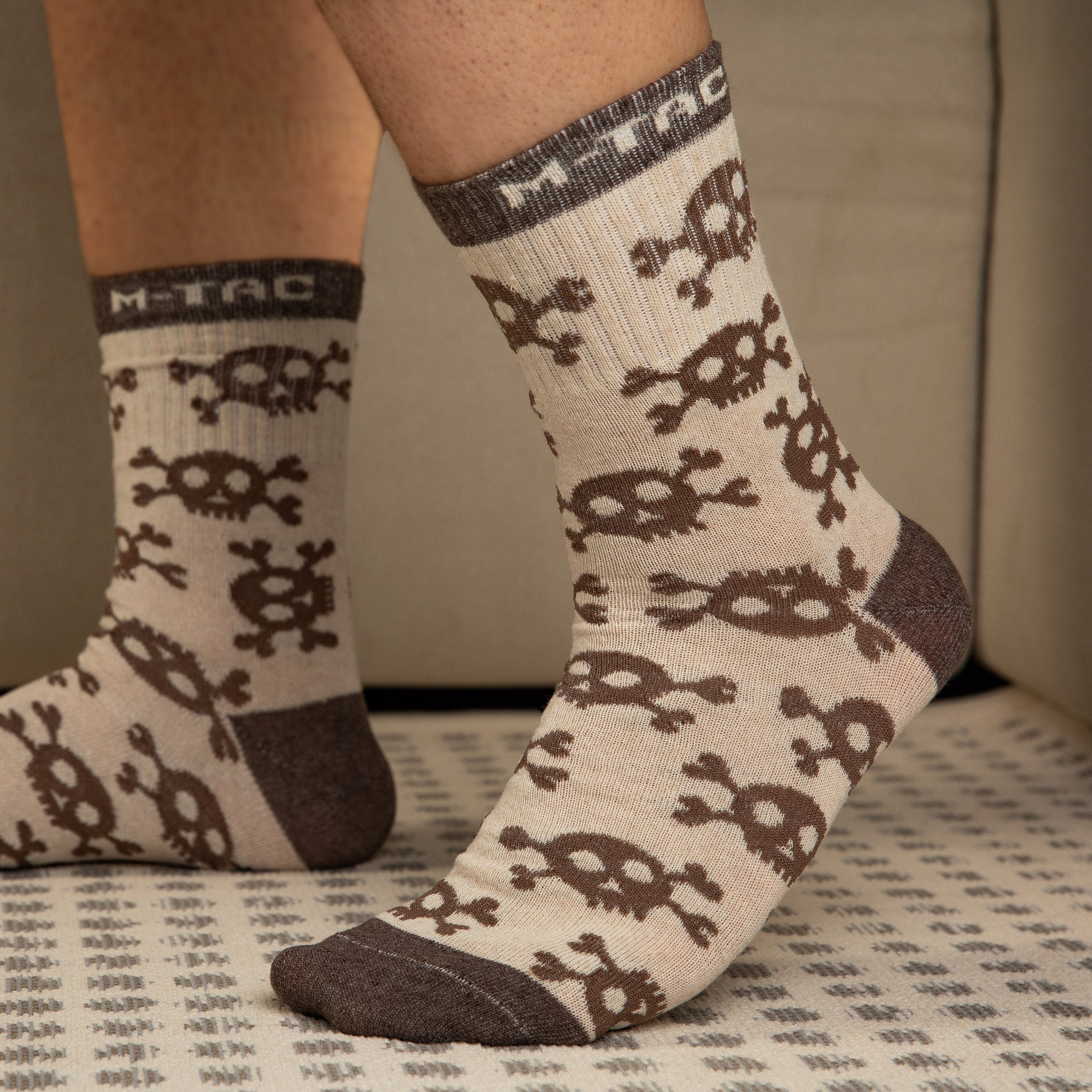 M-Tac mid calf socks featuring a pirate skull design, perfect for tactical and lightweight comfort.