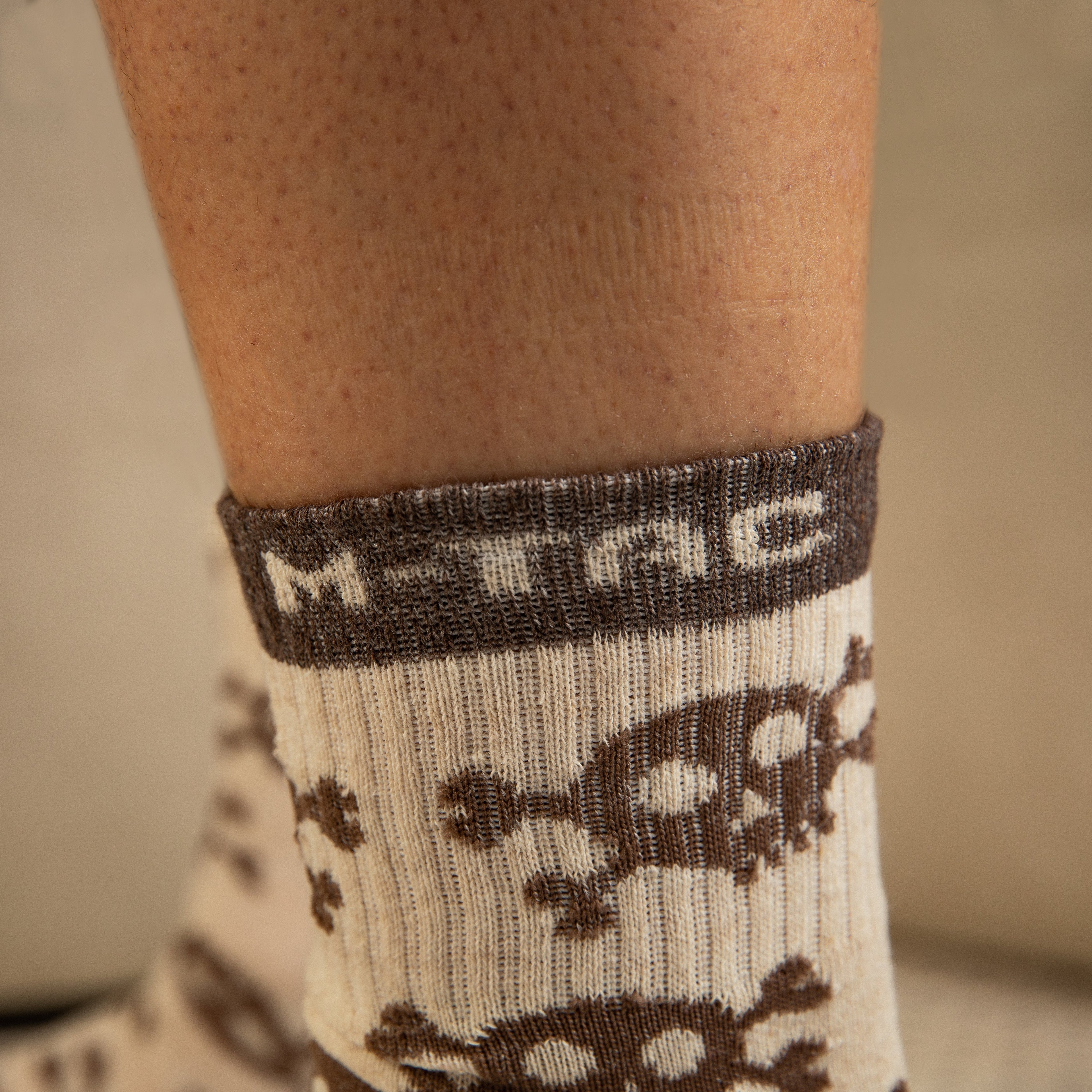 M-Tac lightweight Mk.3 mid calf socks featuring a pirate skull design, perfect for tactical wear.