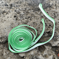 River Hardware rafting flip line stretched out, durable safety rope used for securing and flipping in whitewater rafting activities.