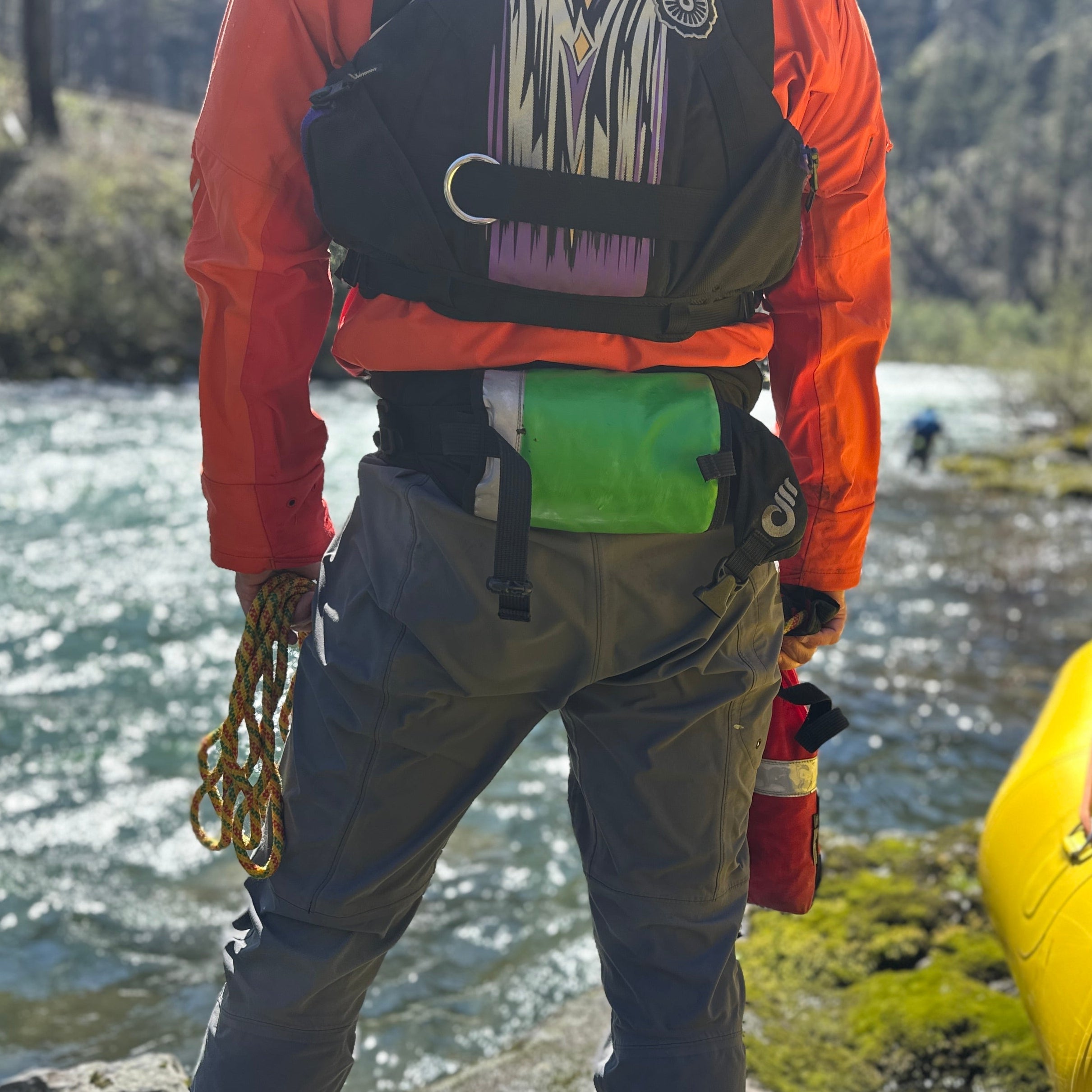 WWTC Classic 20m throw bag with bright orange exterior and black handle for water rescue or safety training.