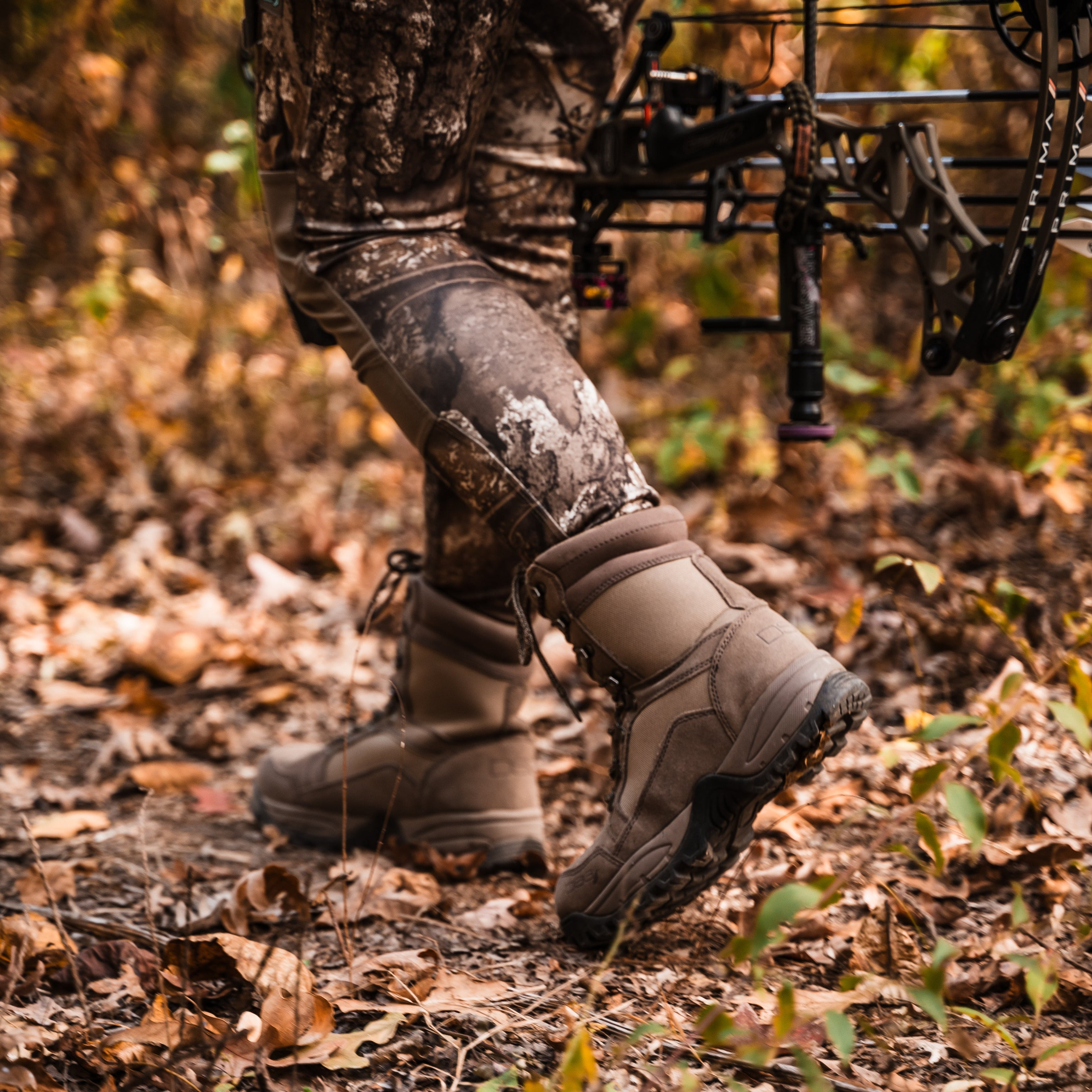 Nubuck tan lace-up boots with 600 gram insulation from DSG Outerwear, featuring sturdy soles and ankle support.