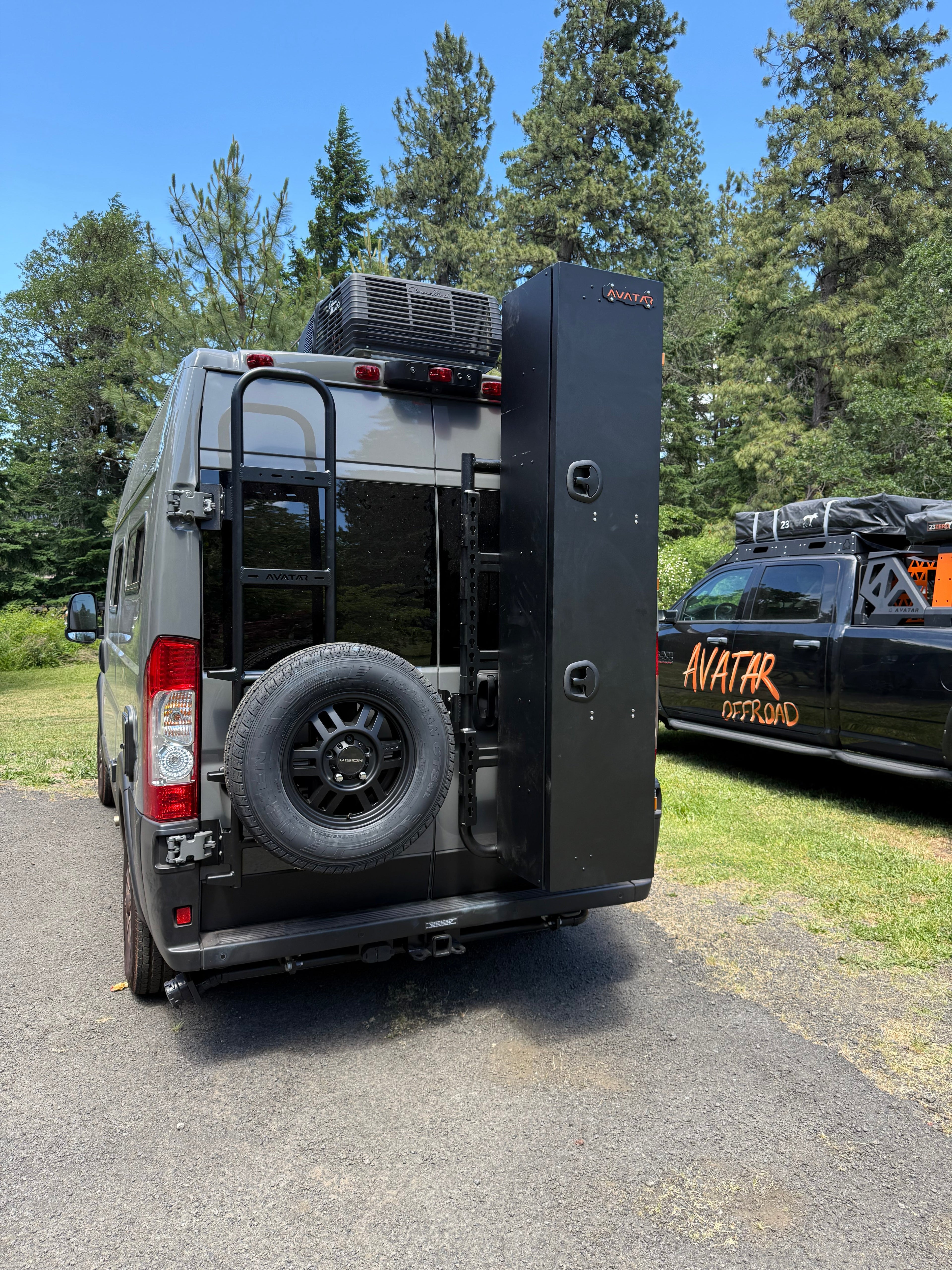 Rear ladder tire carrier mount by Avatar Offroad, showing sturdy metal construction with mounting brackets for rugged off-road use.
