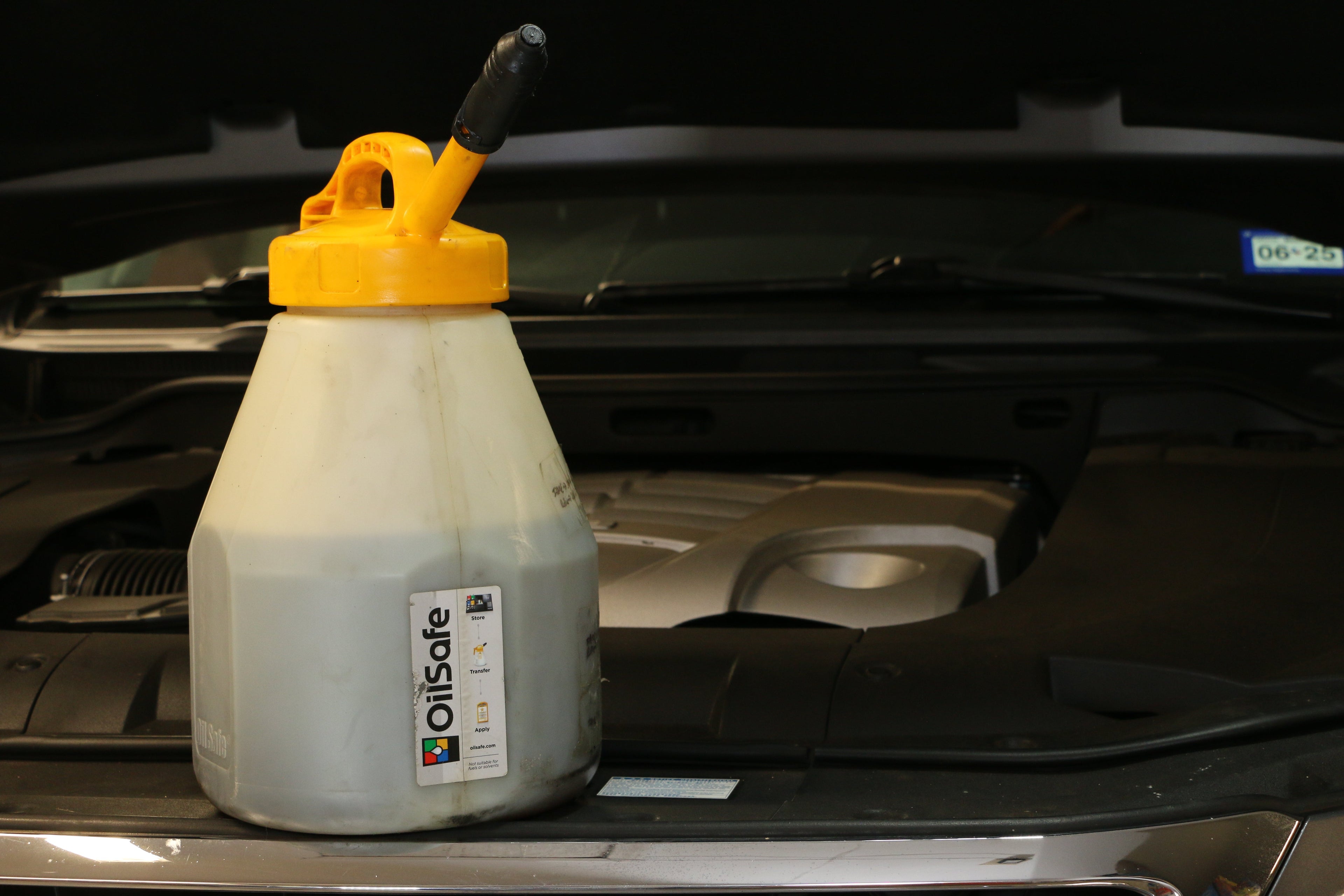OilSafe Stretch Spout transfer container lid with controlled-flow oil transfer for easy, precise oil pouring from DRIVEN Racing Shop.