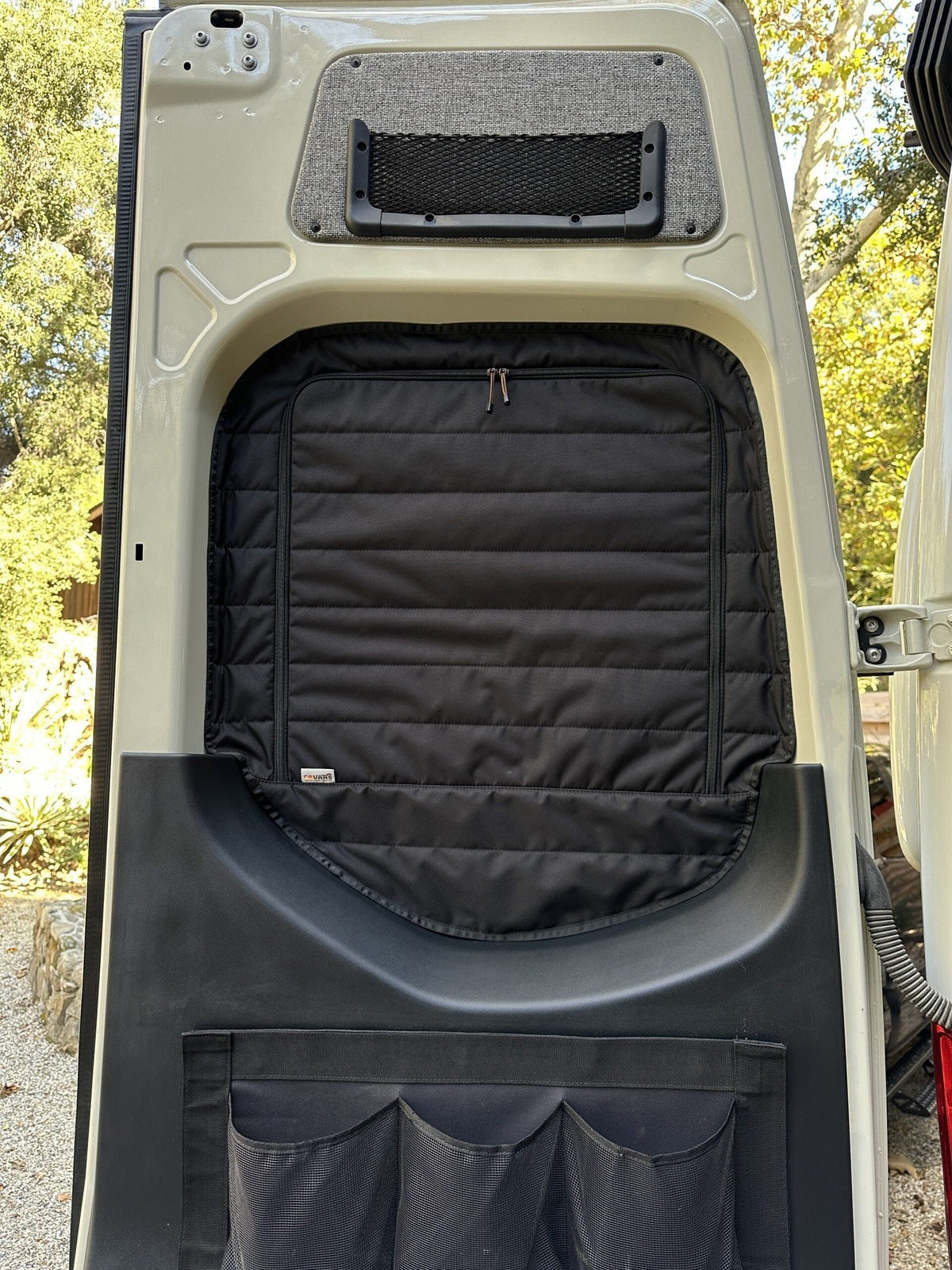 Canyon Adventure Vans CLIMA-SHADE™ insulated rear window covers set for enhanced vehicle privacy and temperature control.