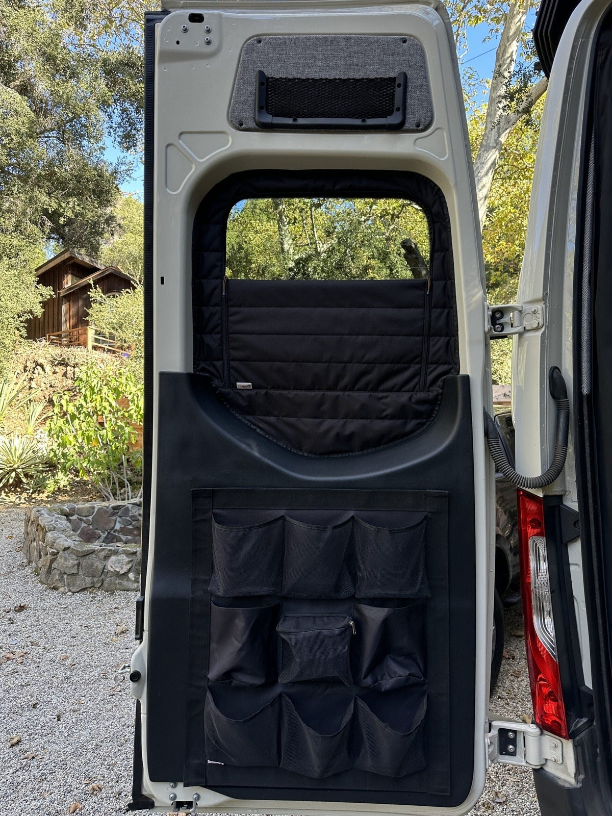 Canyon Adventure Vans CLIMA-SHADE™ insulated rear window covers set for effective temperature control in vehicles.