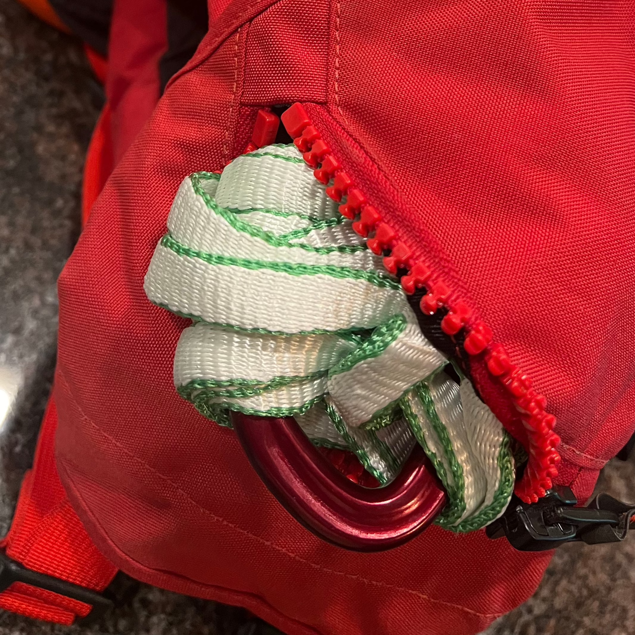 River Hardware rafting flip line hanging on a boat, durable safety gear for rafting and water adventures.
