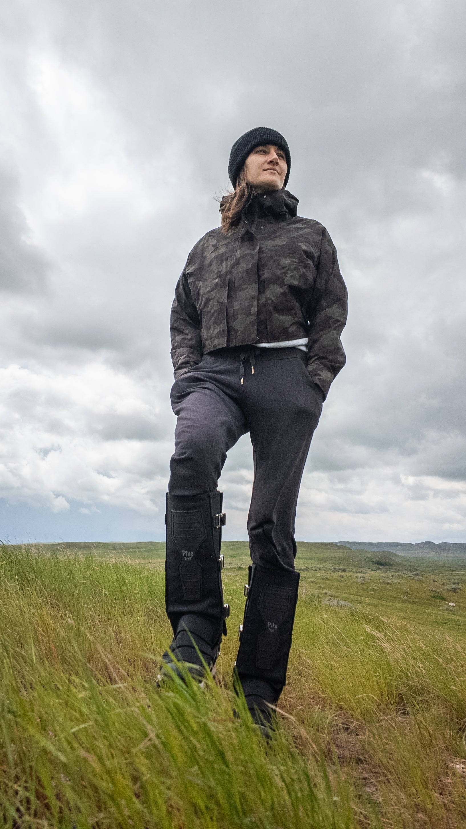 Pike Trail Snake Gaiters leg guards shown in black with adjustable straps, designed to protect legs from snake bites during outdoor activities.