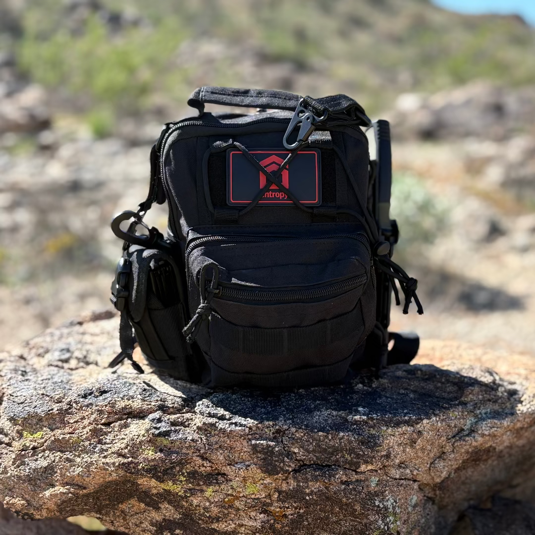 Entropy Survival Safe Trail Survive All emergency preparedness kit with various survival tools and supplies in a compact bag.