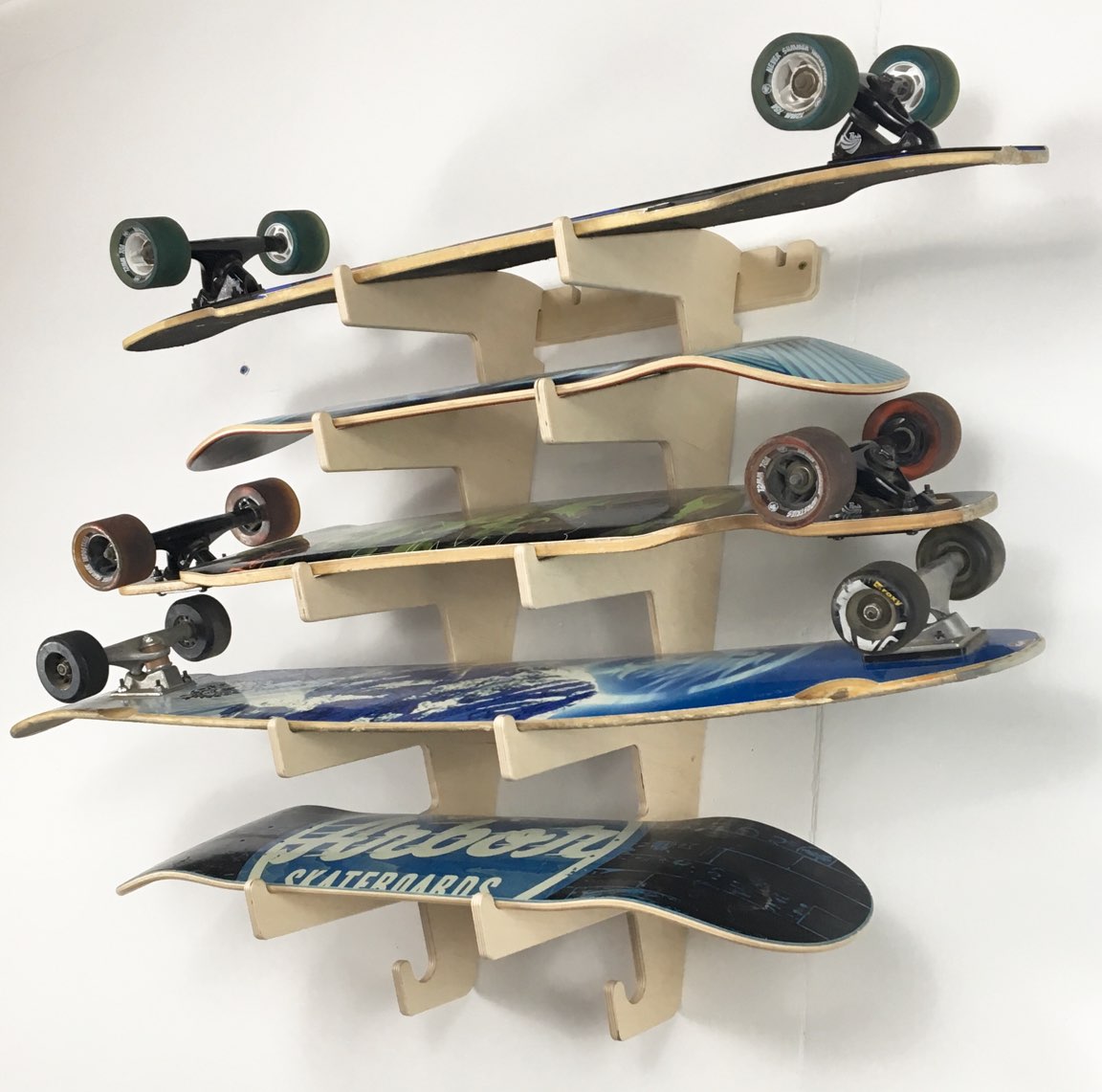 Rado Racks Showcase skateboard wall rack holding a skateboard, mounted on a wall for organized display and storage.