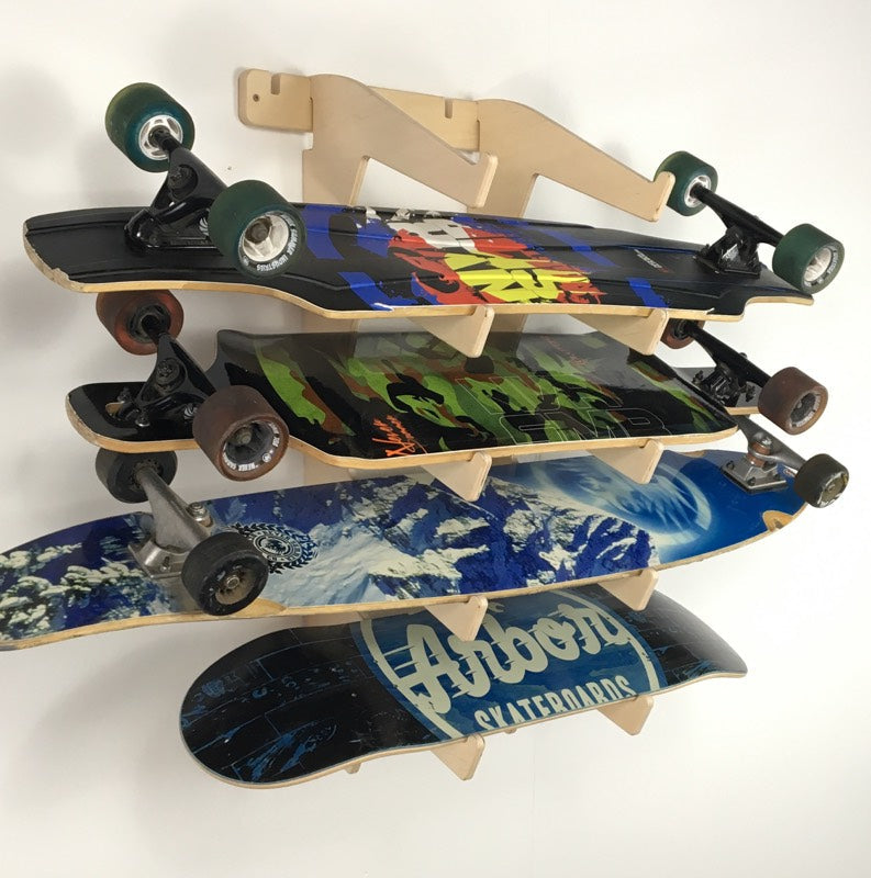 Rado Racks Showcase skateboard wall rack holding multiple skateboards, mounted on a wall for stylish display and organization.