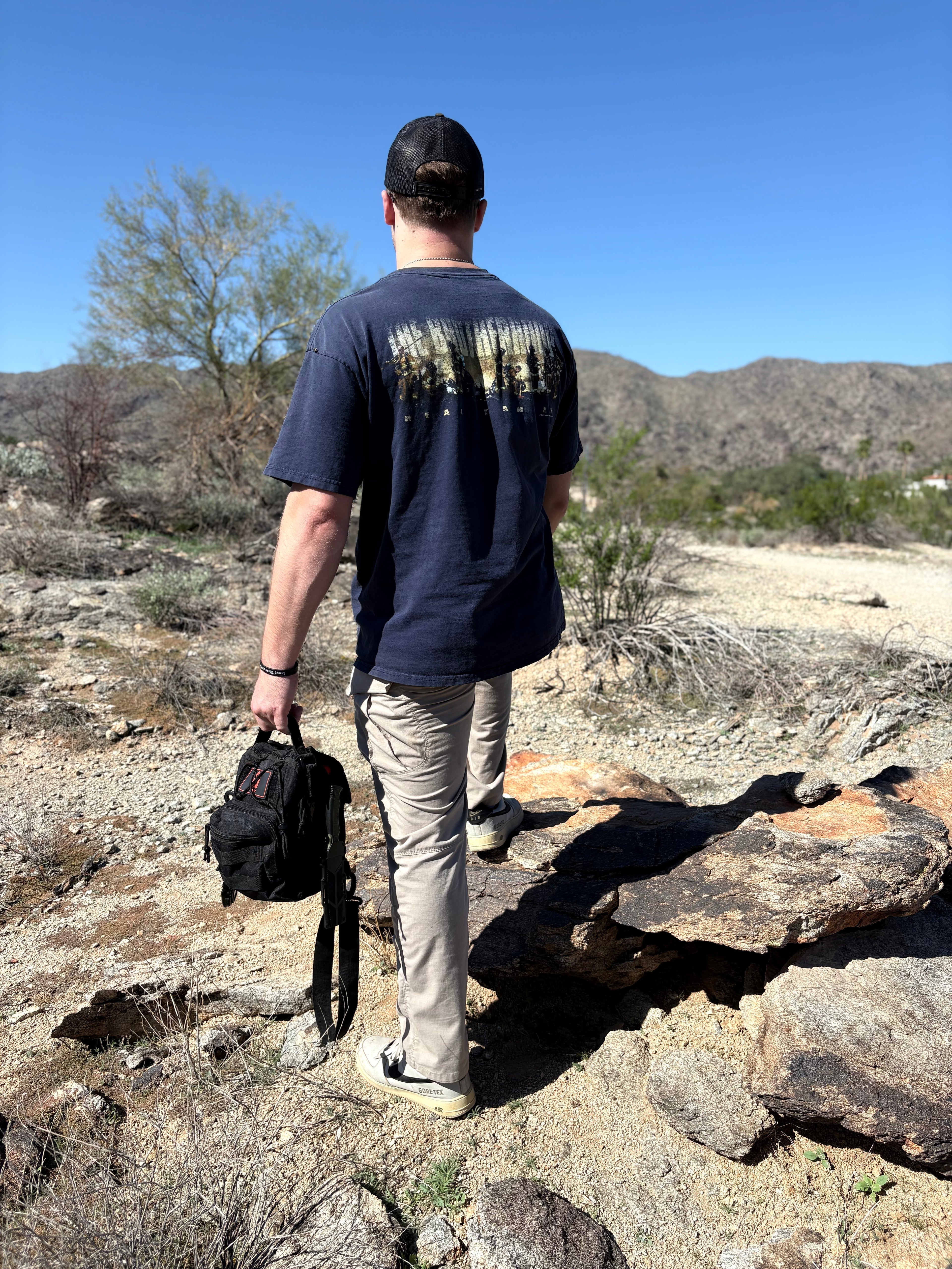Entropy Survival Safe Trail 'Survive All' Go Bag emergency preparedness kit with various survival tools and supplies.