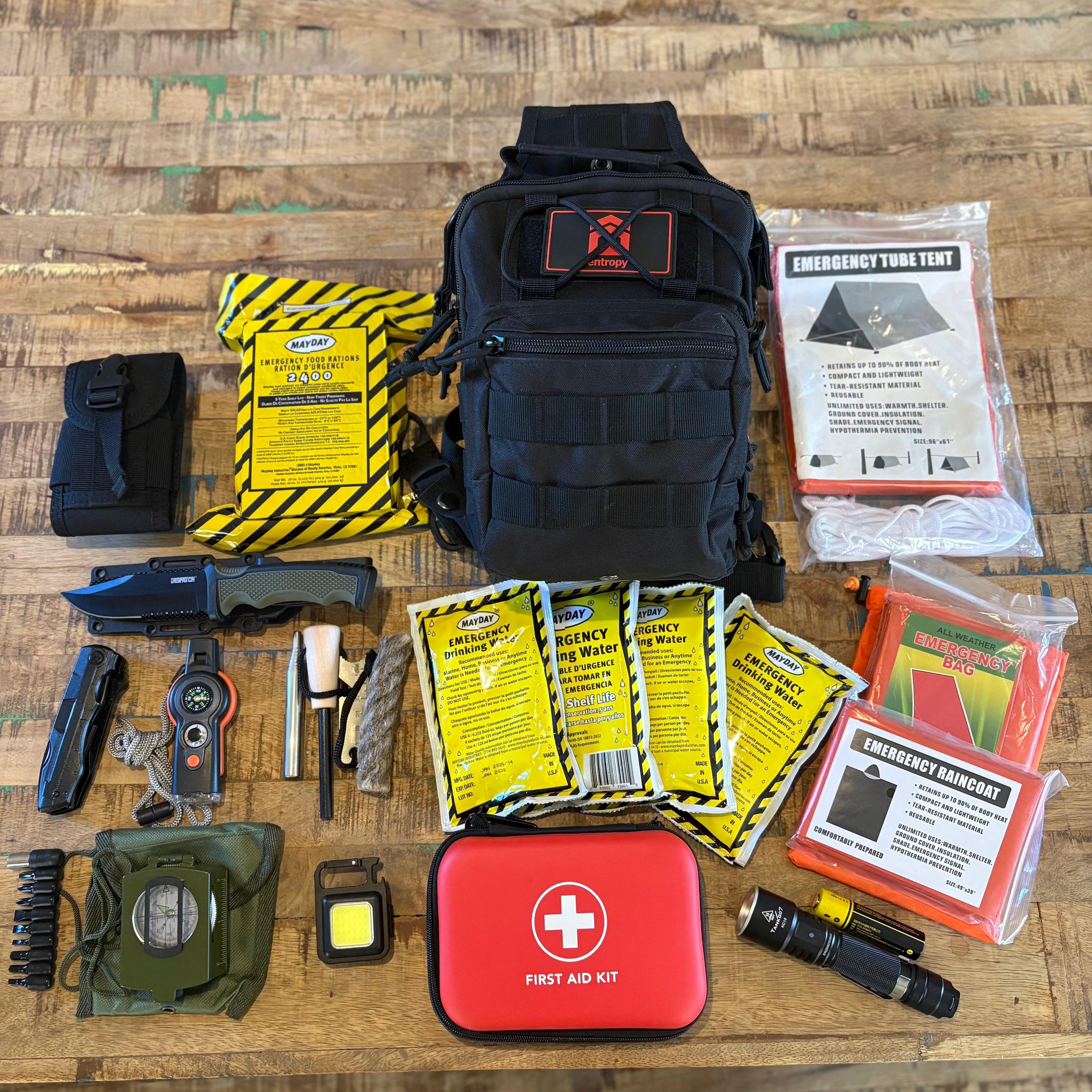 Entropy Survival Safe Trail Survive All Go Bag emergency preparedness kit with survival gear and supplies in compact black bag.