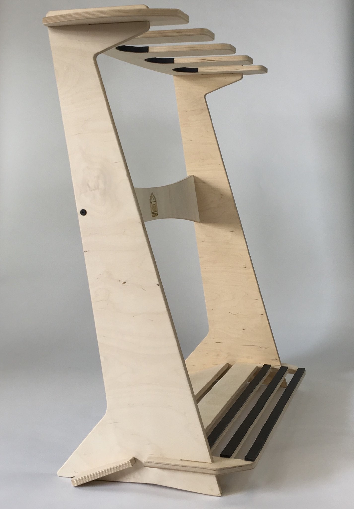 Freestanding surfboard rack by Rado Racks, showcasing multiple surfboards displayed in an organized, stylish manner.