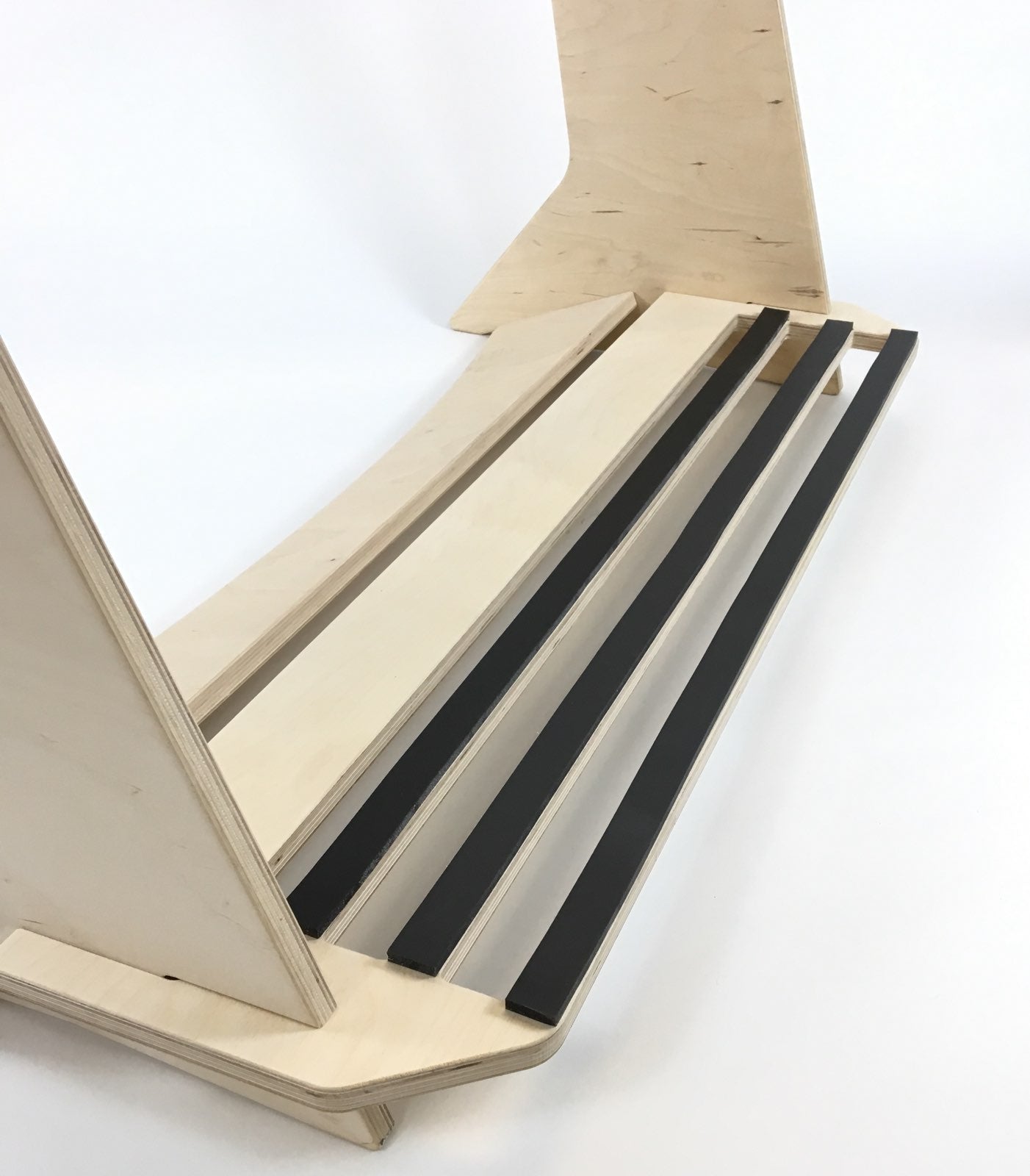 Freestanding surfboard rack by Rado Racks, showcasing multiple surfboards organized and displayed on a sturdy frame.