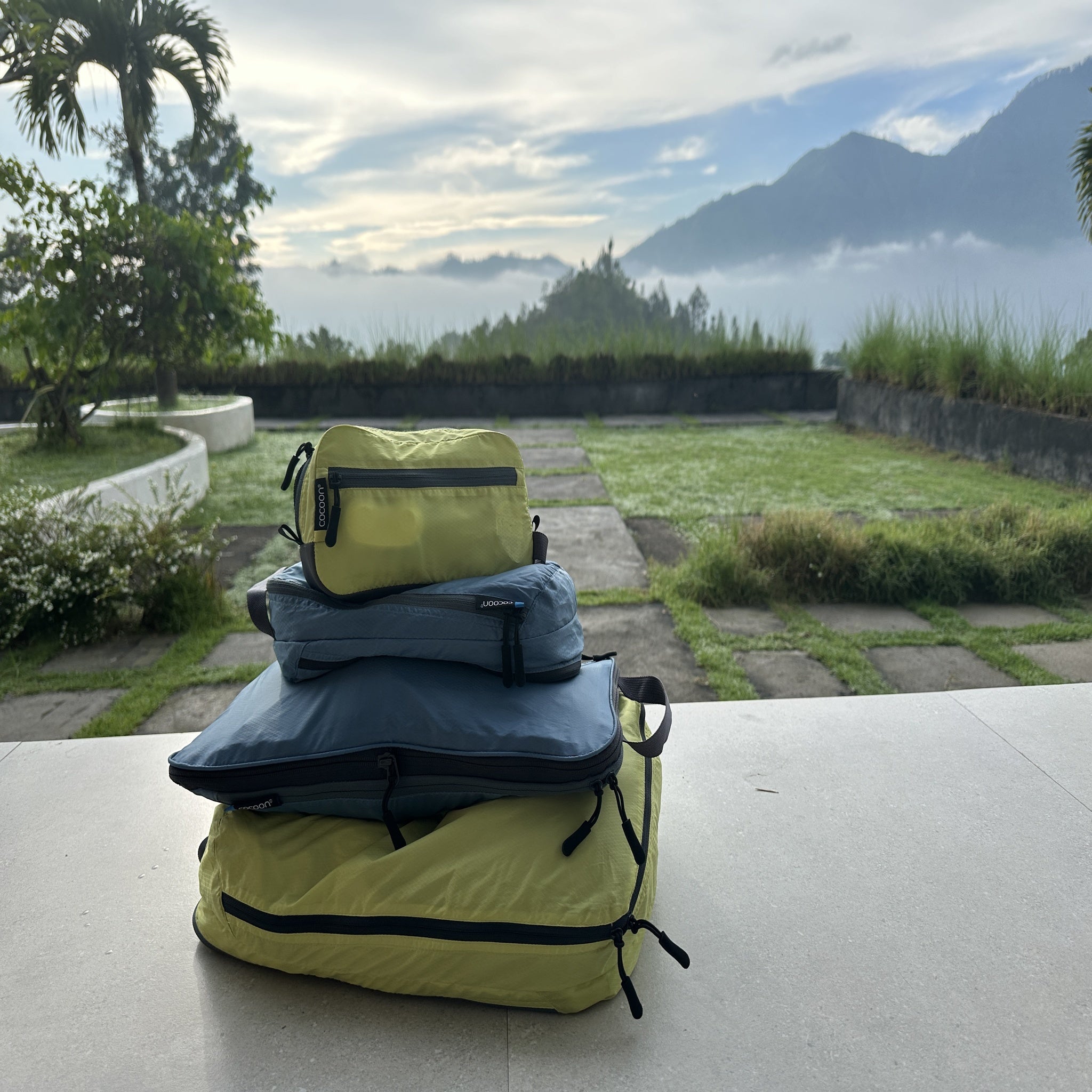 COCOON Two-In-One Separated Packing Cube Light showing organized compartments for travel storage